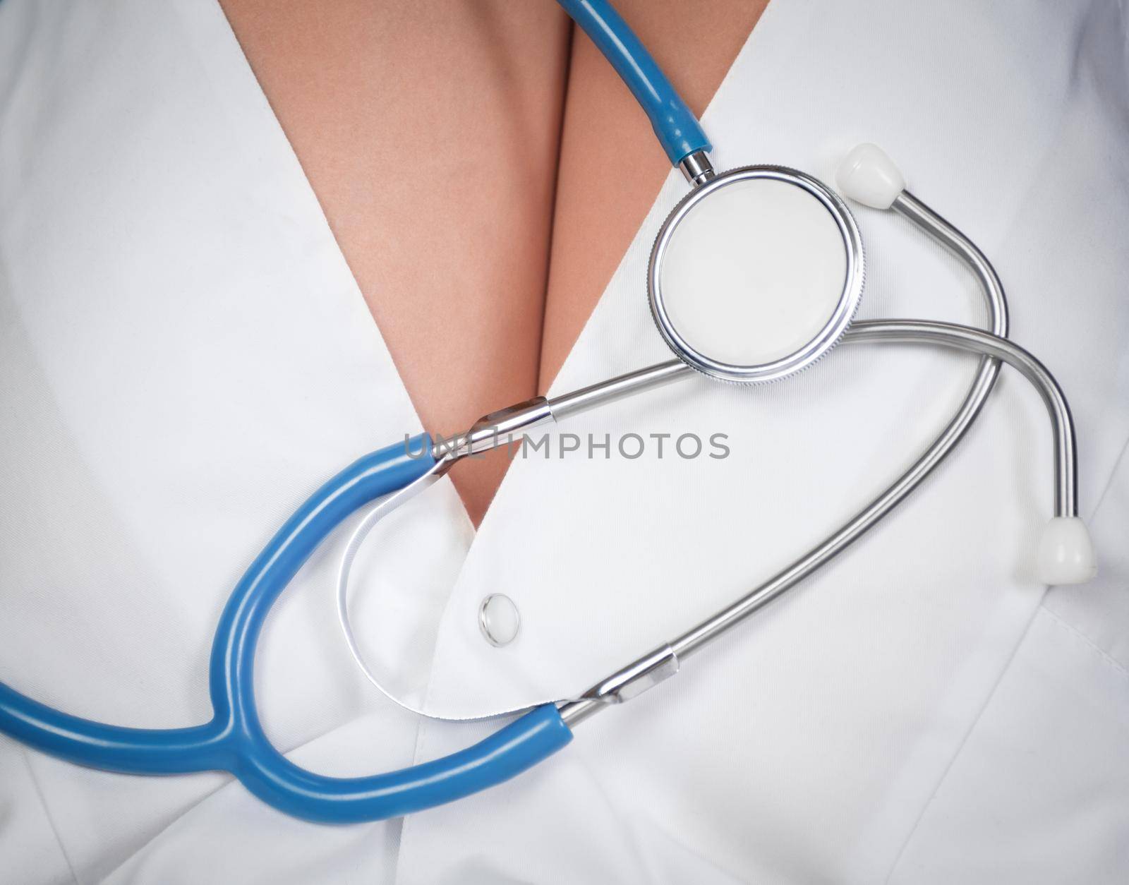 Stethoscope on background of woman sexy hips doctor