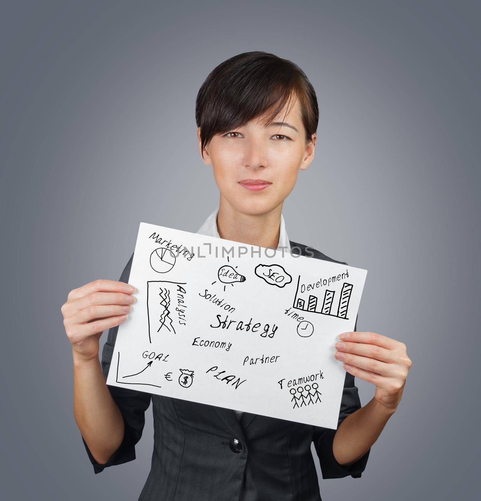 Young businesswoman holds a white paper banner with creative project