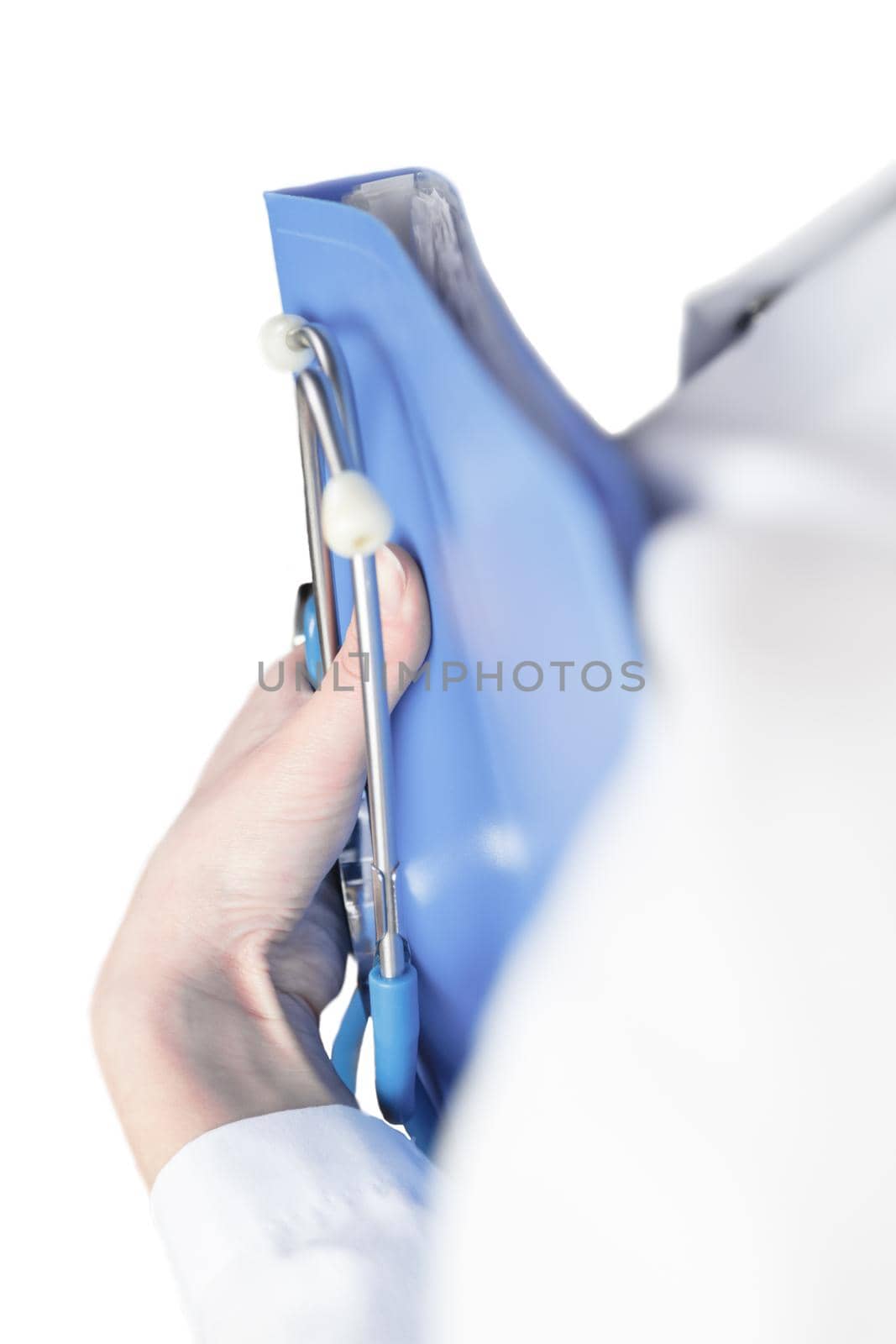 Doctor holding working folder and stethoscope