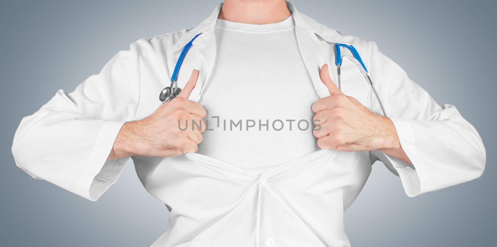 Male doctor pulling open white coat on the chest