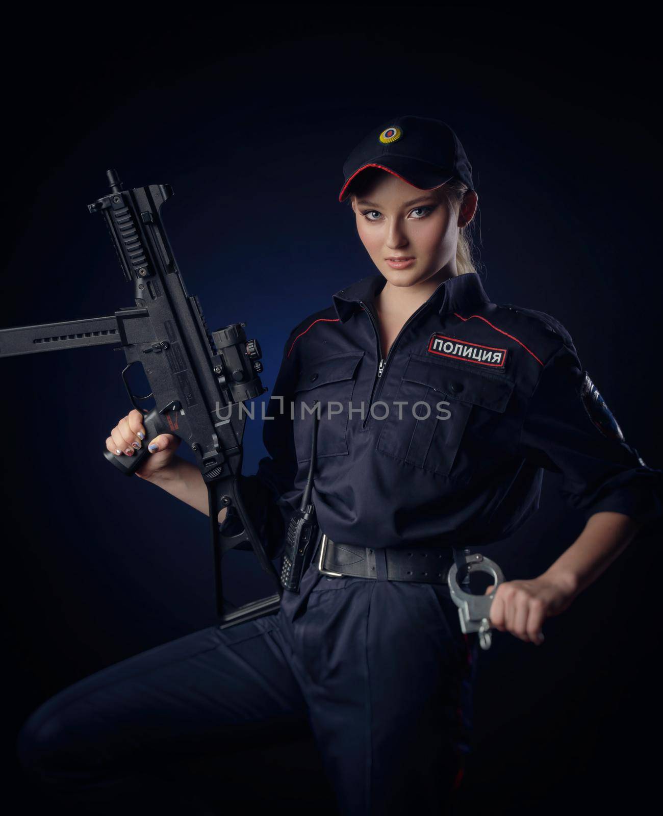 the girl in the police uniform with a gun is a Russian policeman with gun. English translation of Police by Rotozey