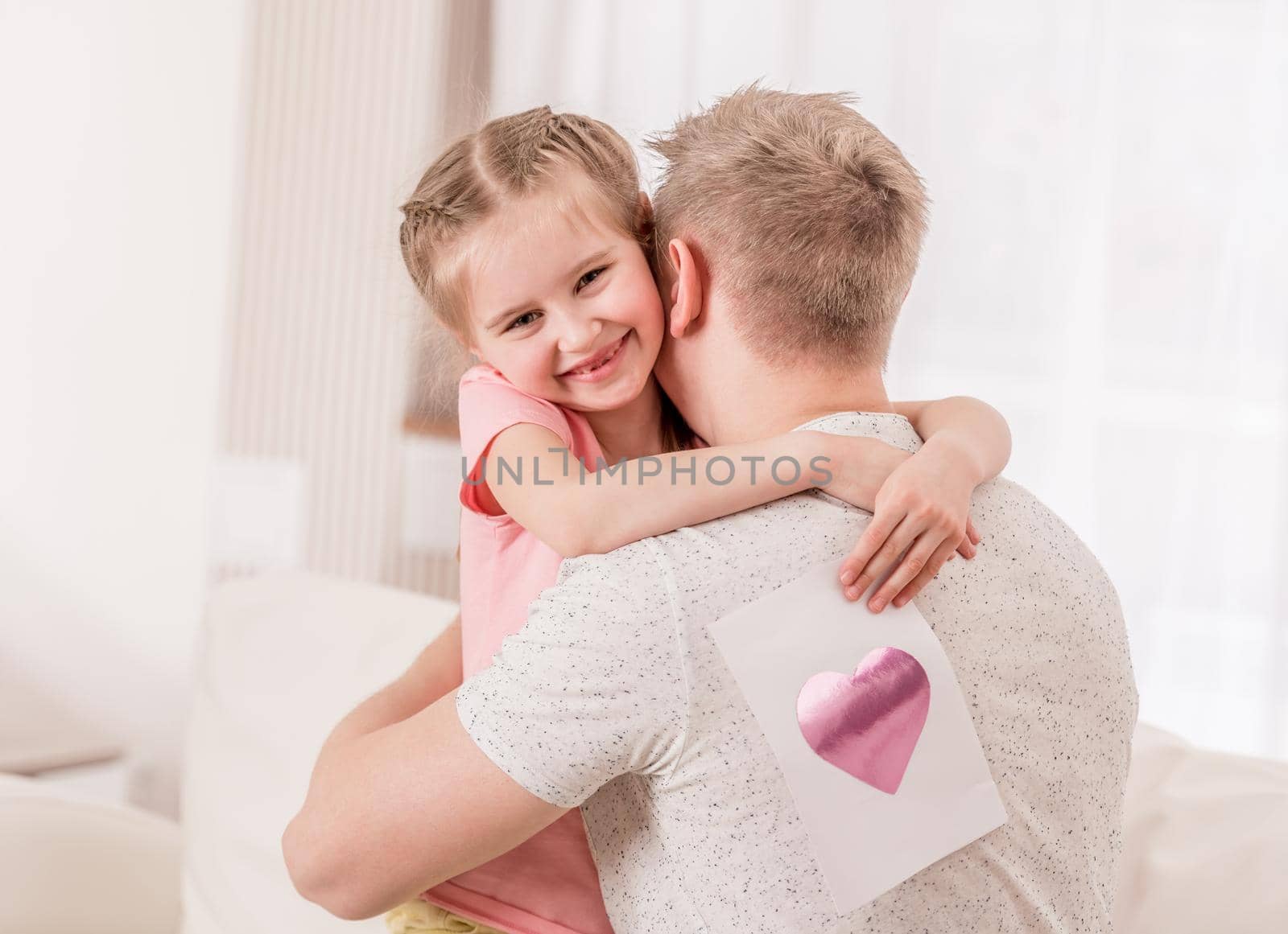 Nice kid gave lovely picture of a heart to her dad, on Fathers day