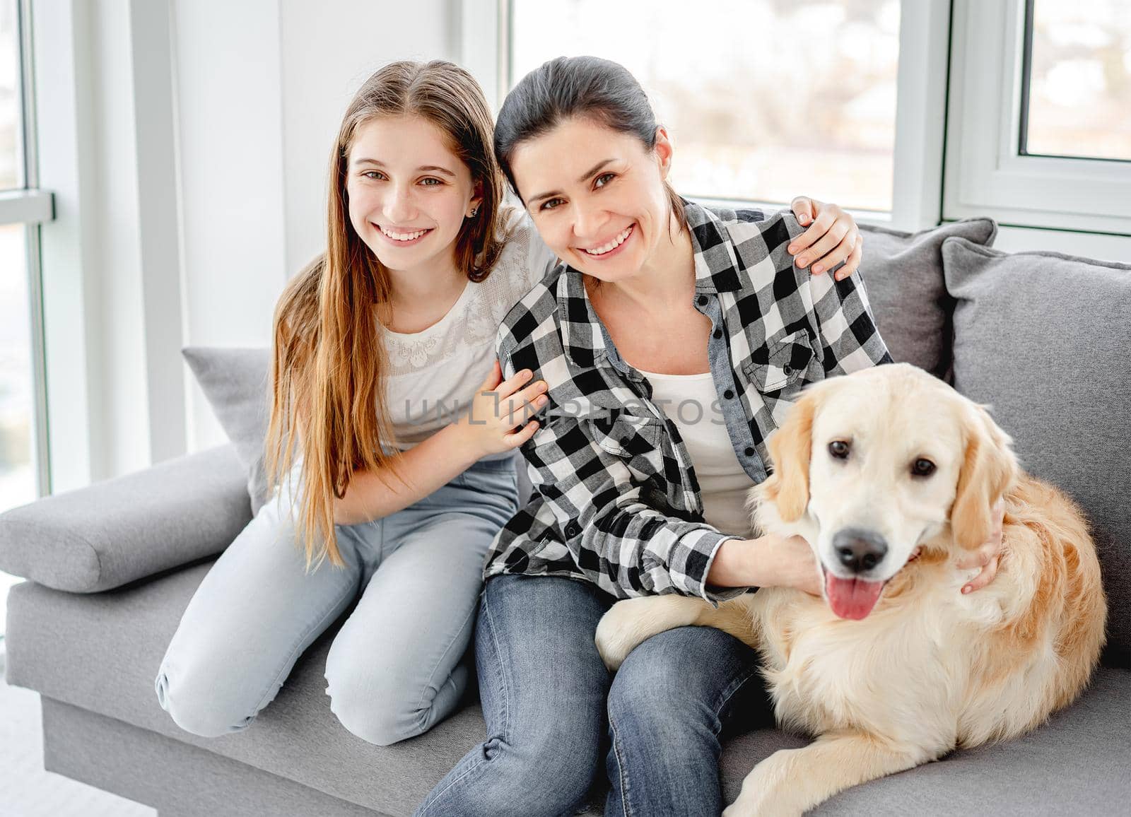 Daughter and mother next to dog by tan4ikk1