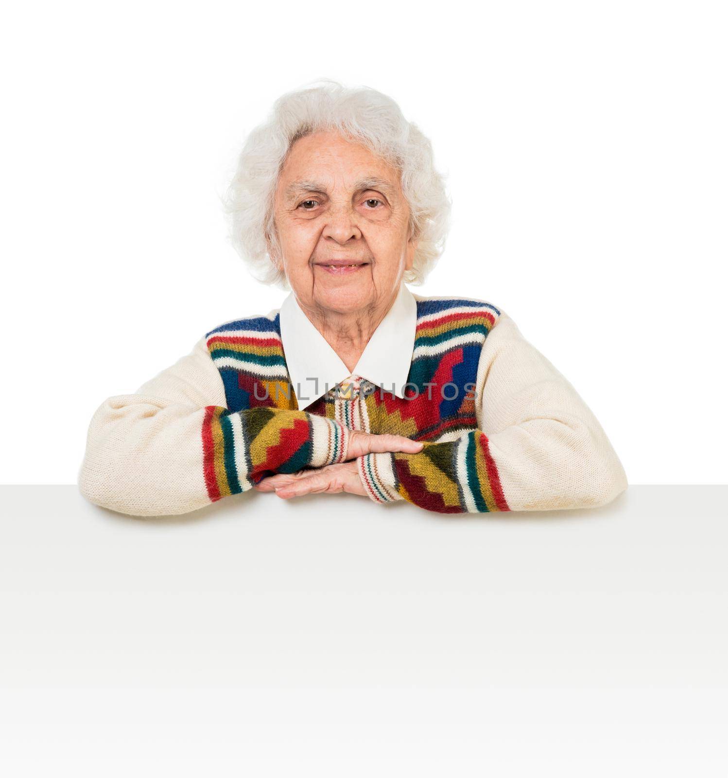 elderly woman behind an advertising board over white background