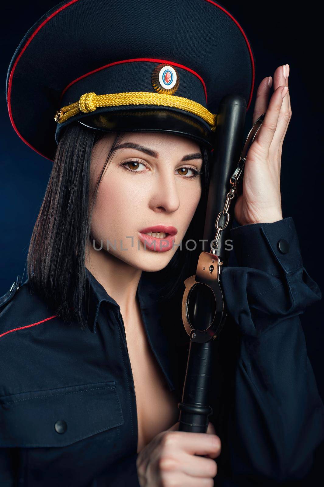 the Portrait of a woman in a Russian police uniform English translation police