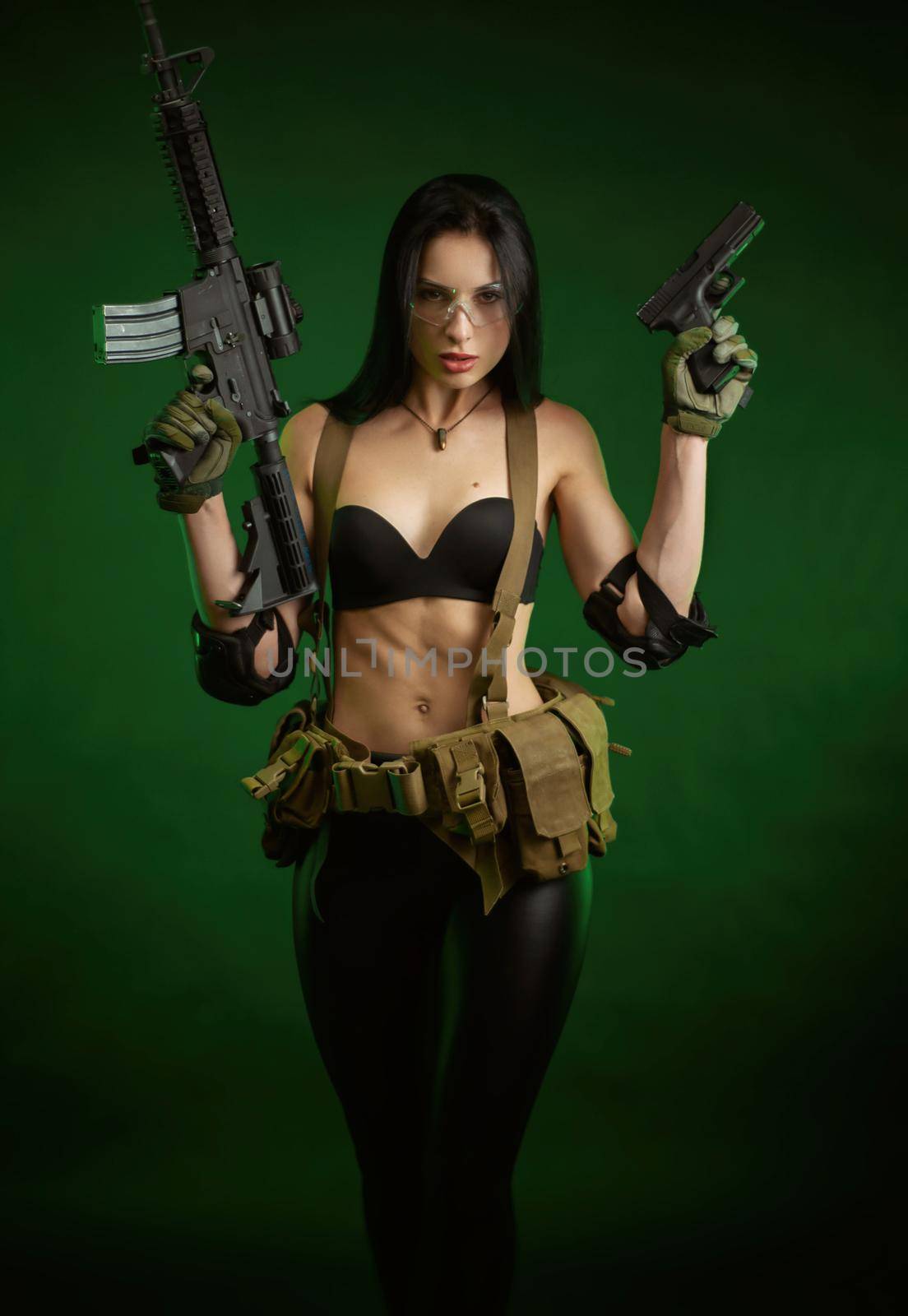 slender woman in military fatigues with an American automatic rifle on a green background by Rotozey