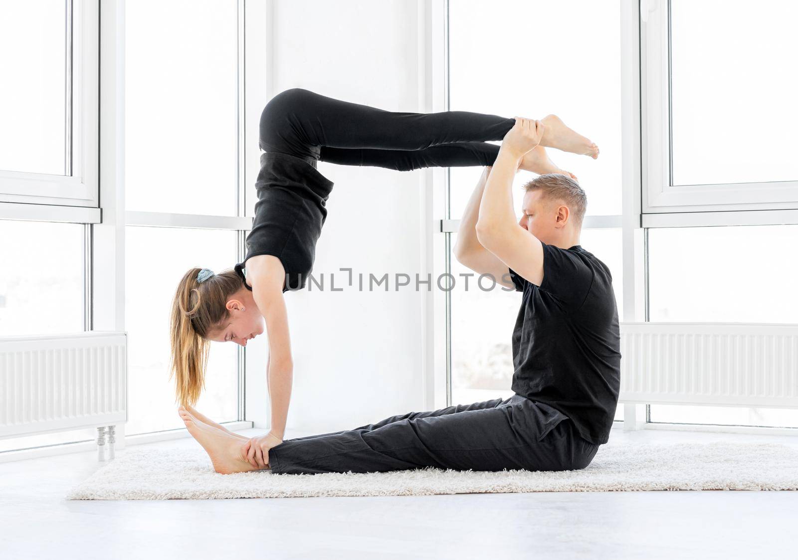 Beautiful couple making acrobatics by tan4ikk1