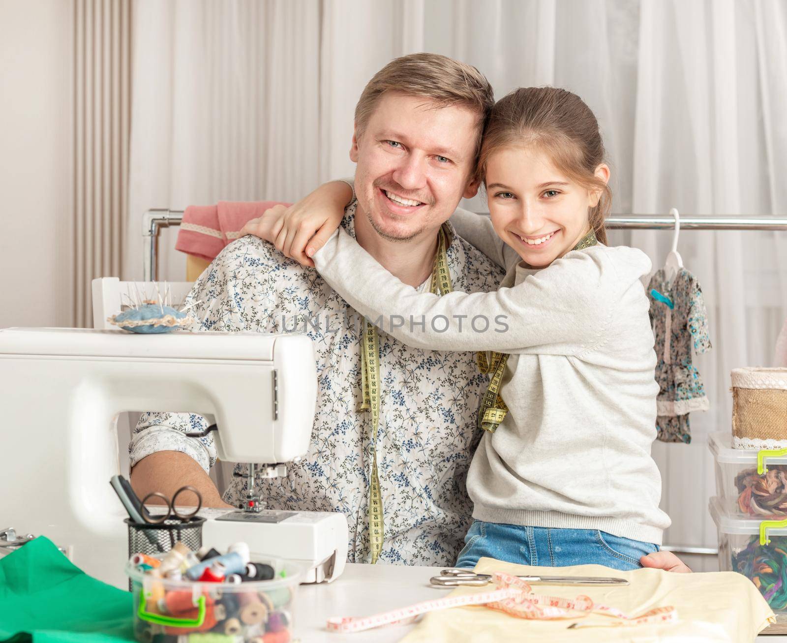 little girl and her dad in a sewing workshop by tan4ikk1