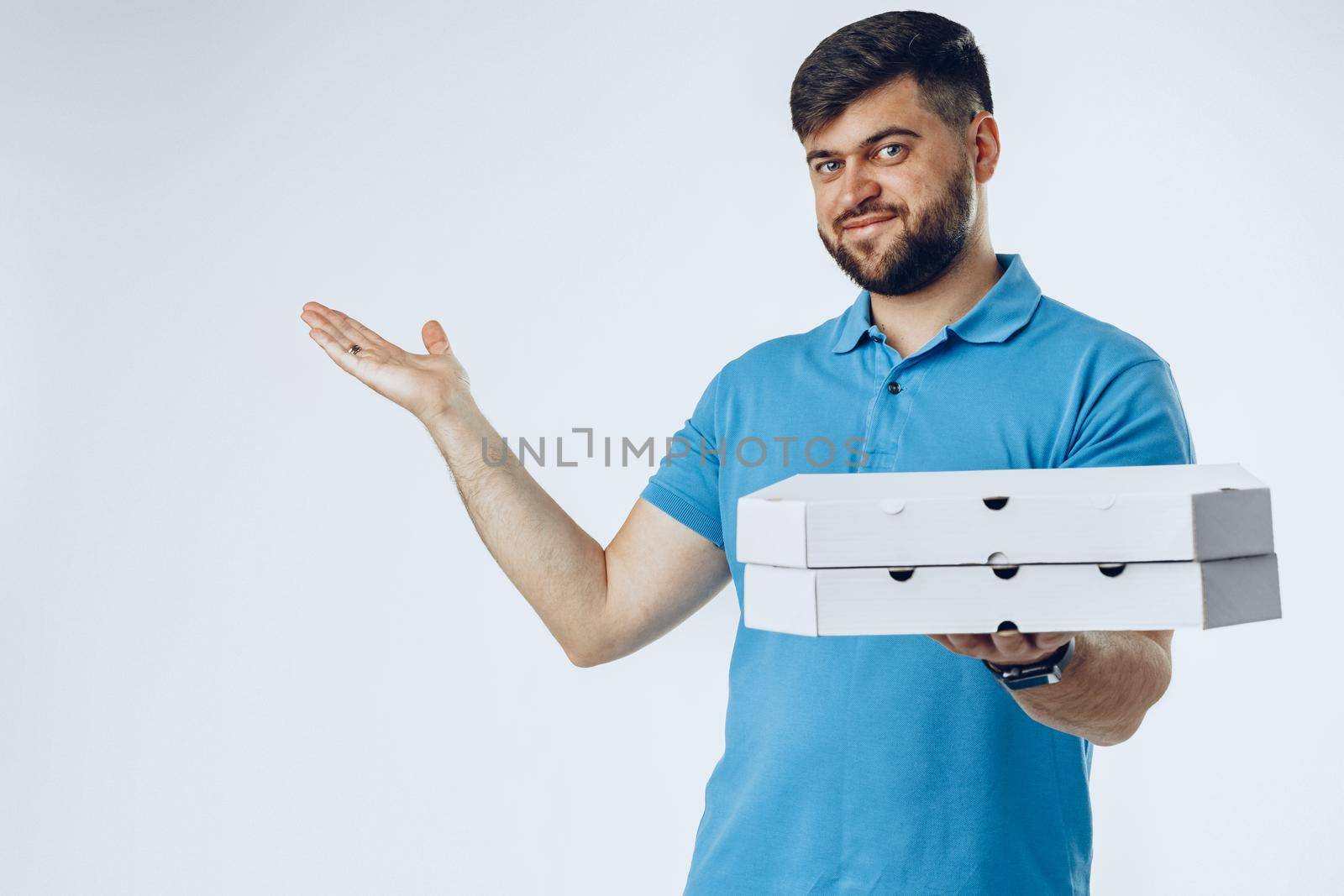 Food delivery courier with order on light grey background