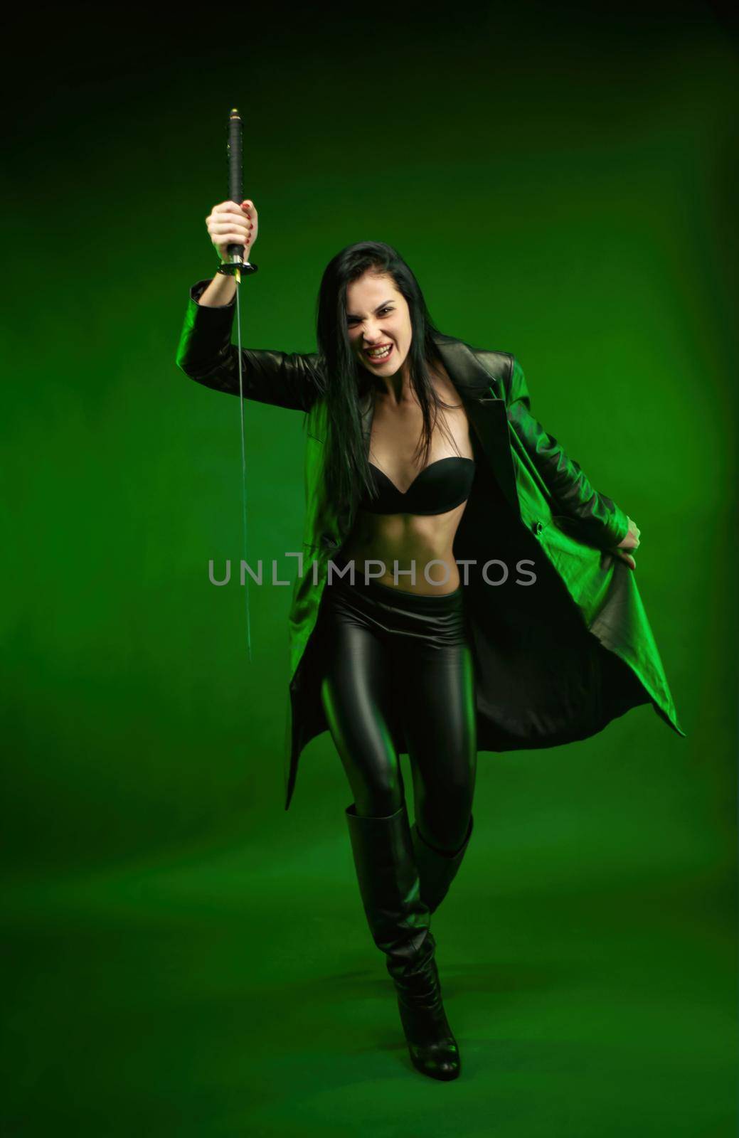 slender woman in a black leather katana cloak on a green background by Rotozey