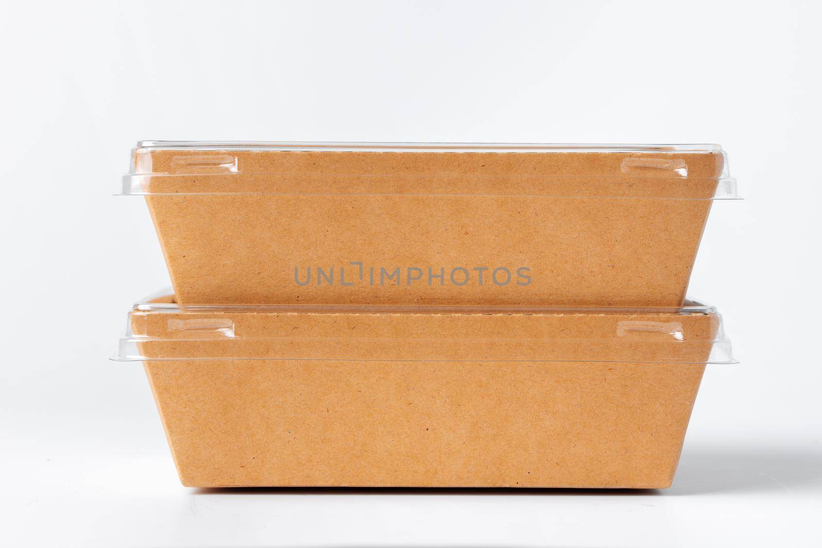 Cardboard brown food box pack isolated on white background close up