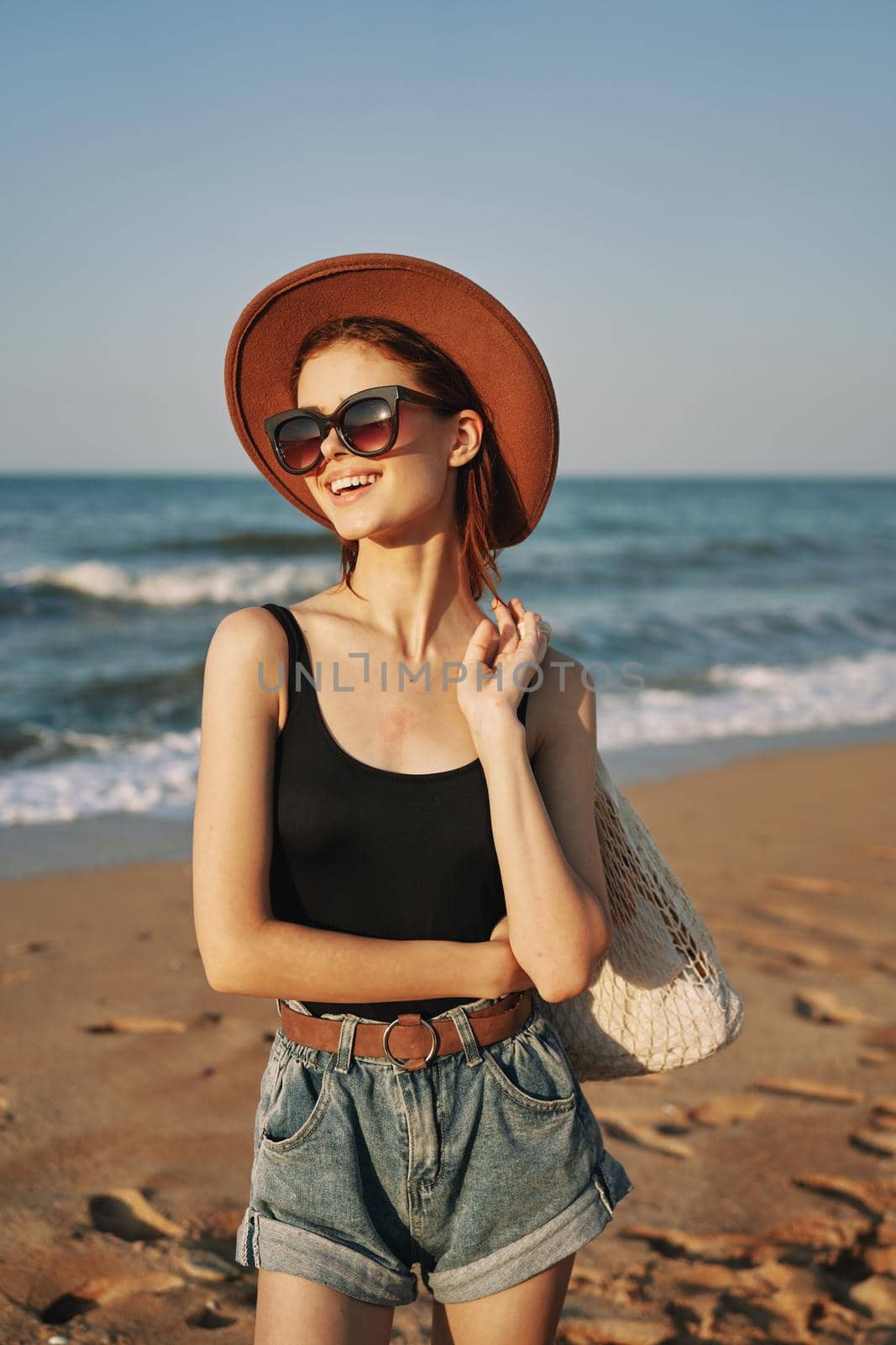 woman walking on the beach landscape sun fun lifestyle by Vichizh