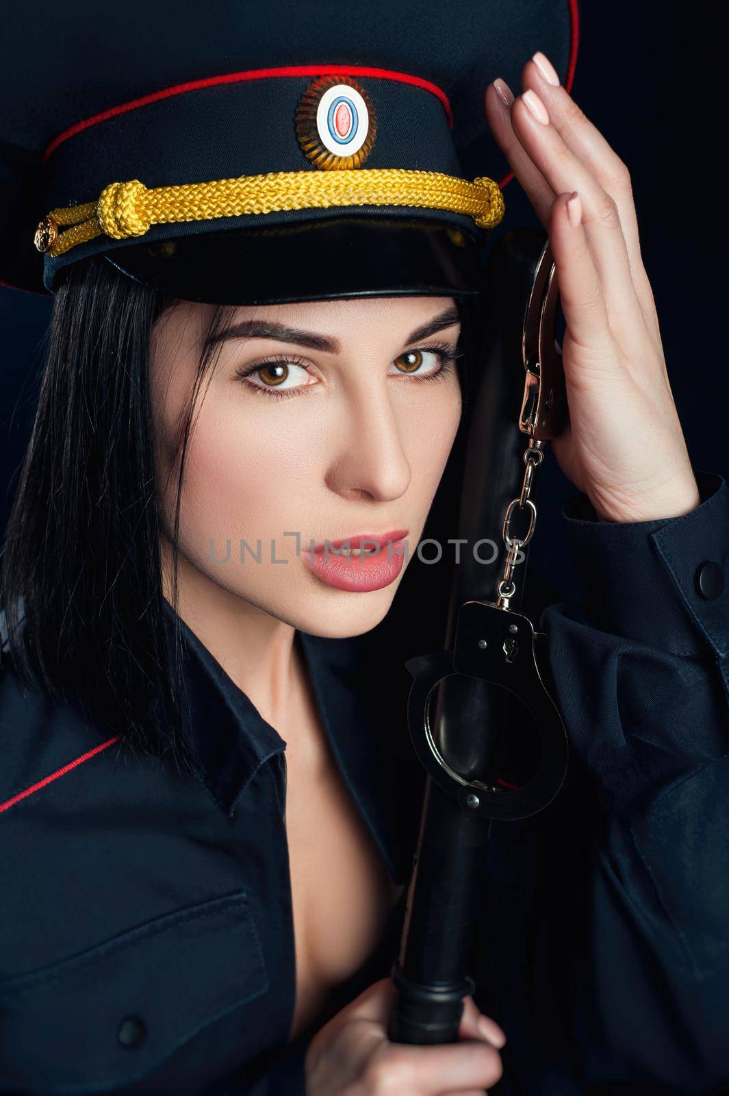 Portrait of a woman in a Russian police uniform English translation police by Rotozey