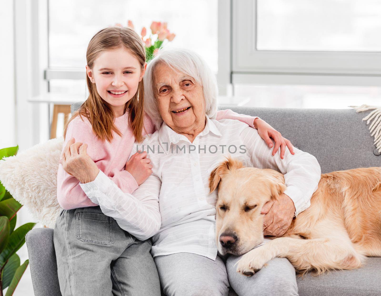 Grandmother with granddaughter and dog by tan4ikk1