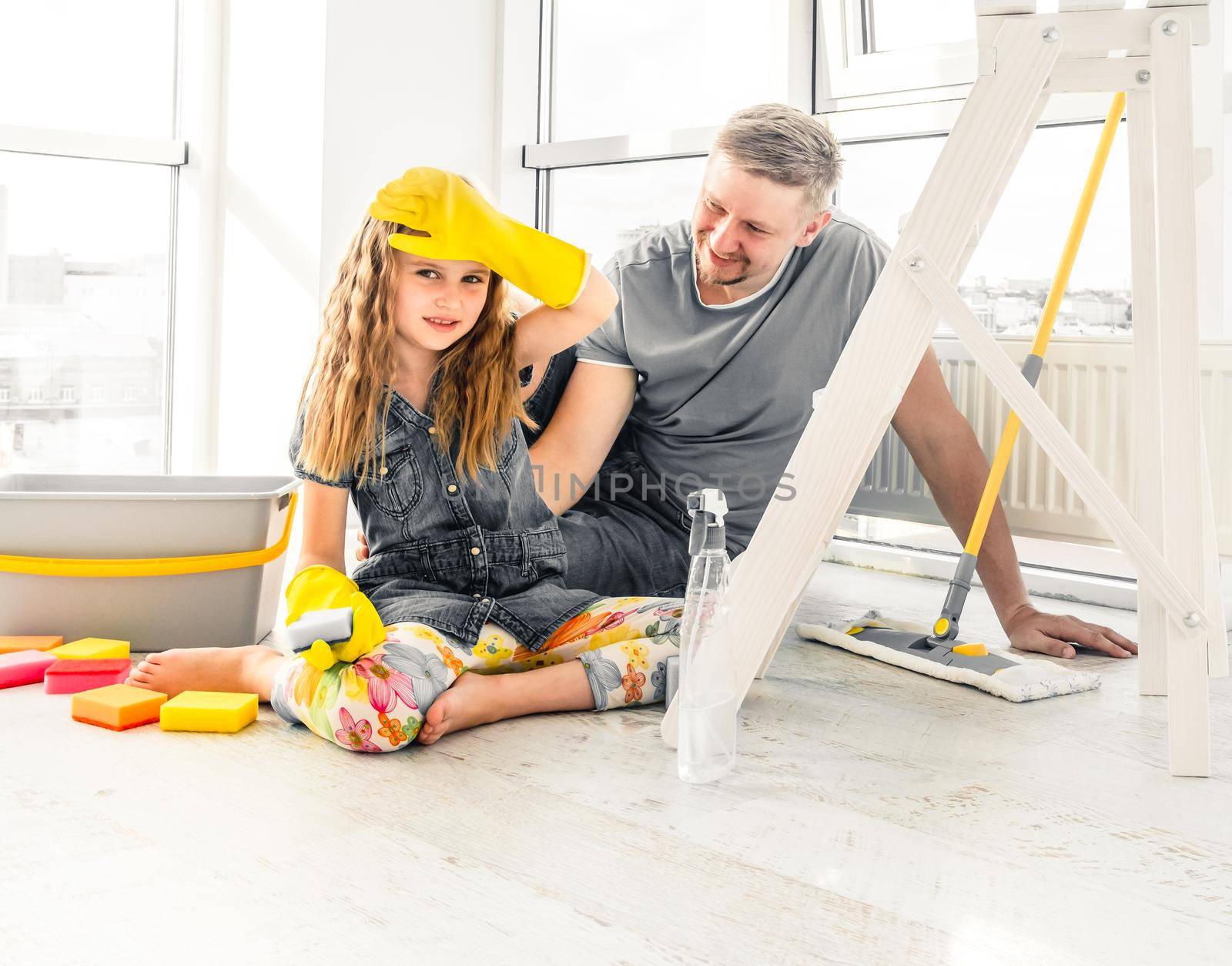 Little girl helping dad at cleaning by tan4ikk1