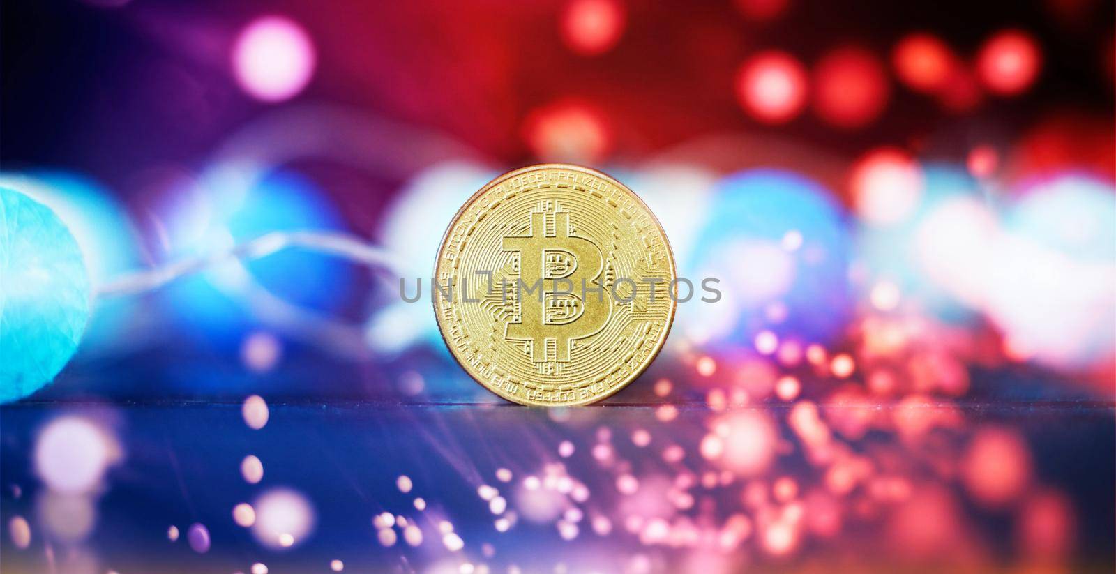 Investment platform with charts and bitcoin coin. Bitcoin BTC Cryptocurrency Coins. Stock Market Concept. by Maximusnd