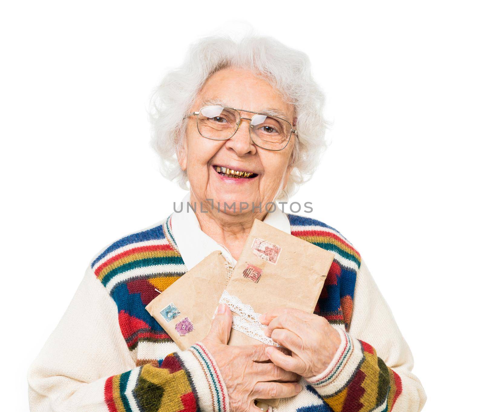 elderly woman holding old envelops isolated on white background