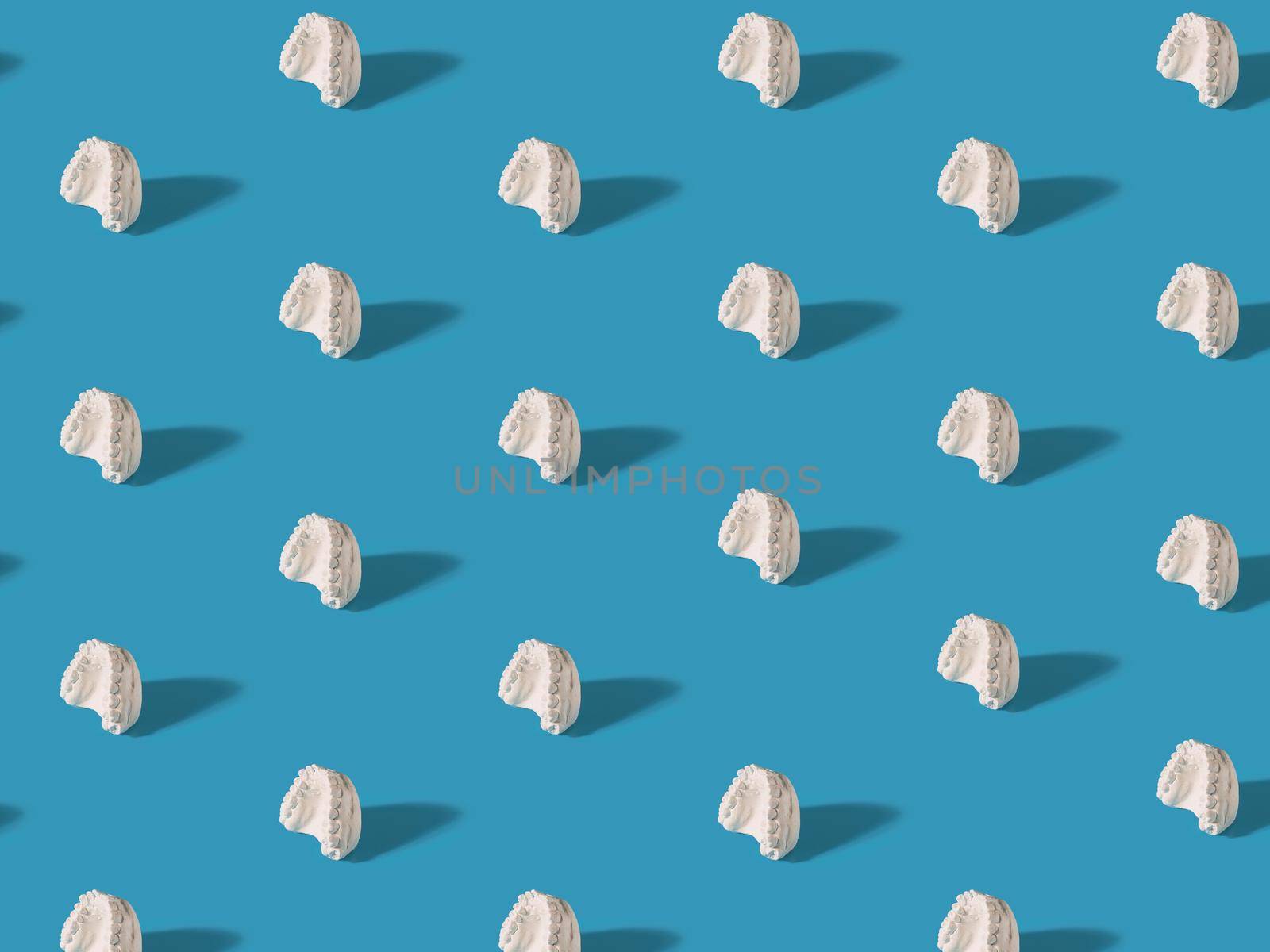 Minimal concept.Trendy braces pattern made with various braces on bright light blue background.