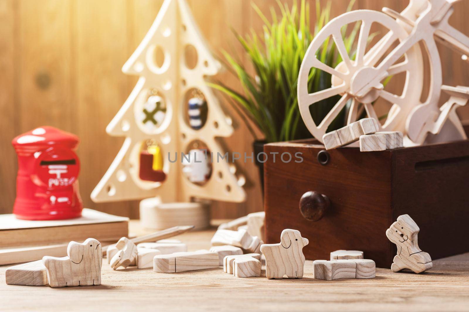 cute wooden toy animal on wood board, tiny toys and shallow depth of field
