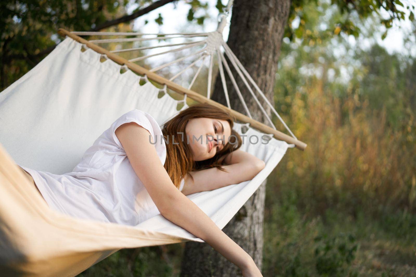 woman sleeping outdoors fresh air vacation travel by Vichizh