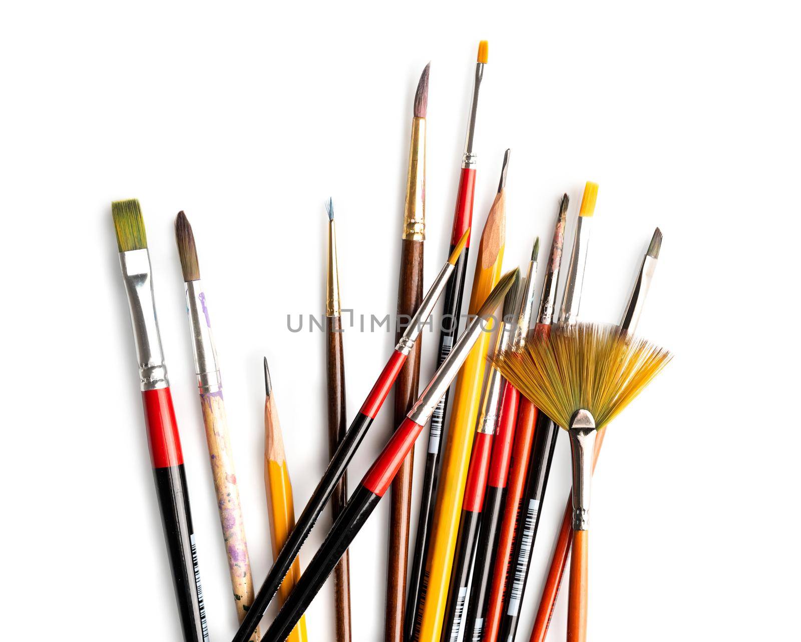 Professional set of painting tools, brushes and pencils, isolated on white background