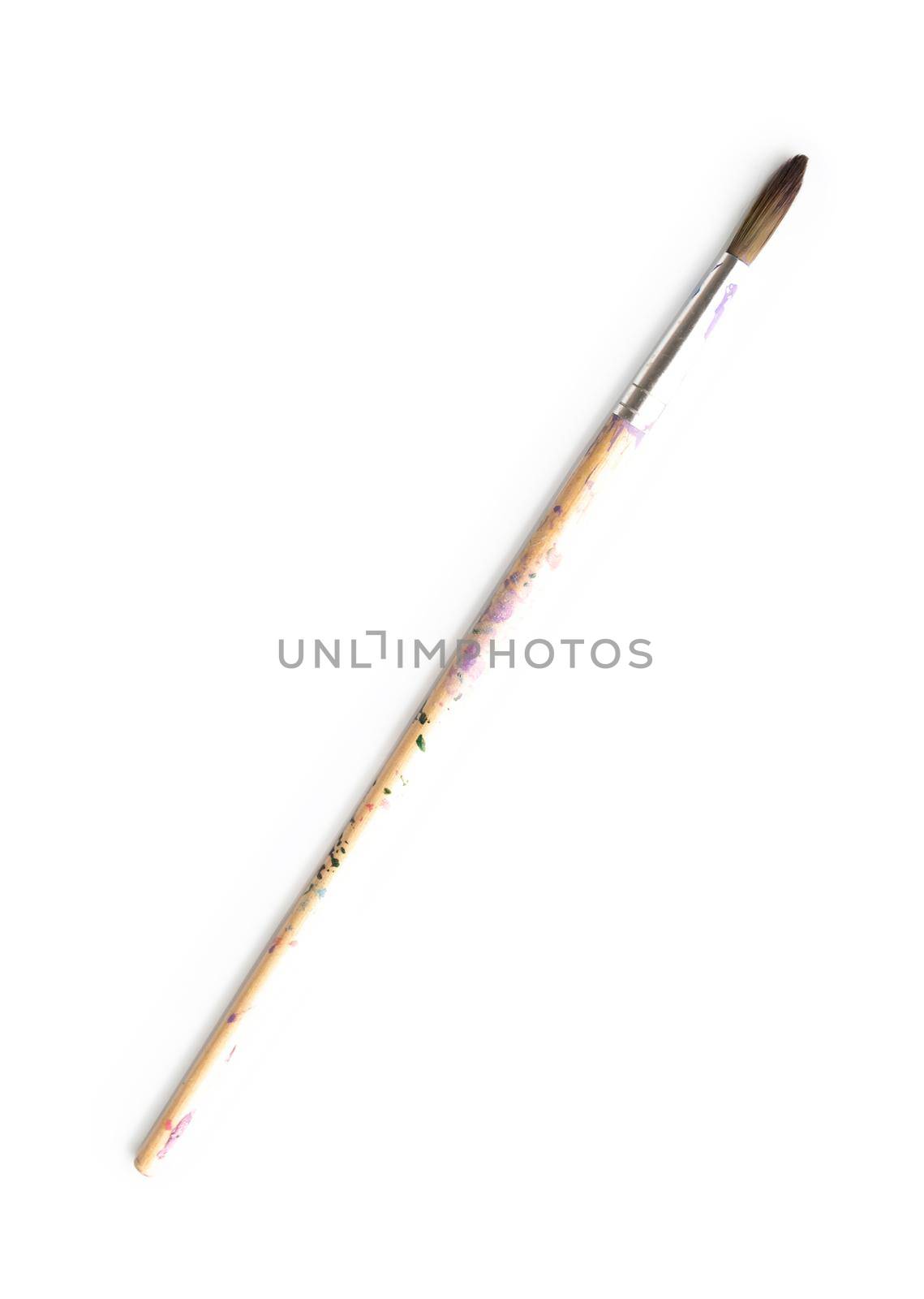 Stained this painting brush, made of hair, isolated on white background