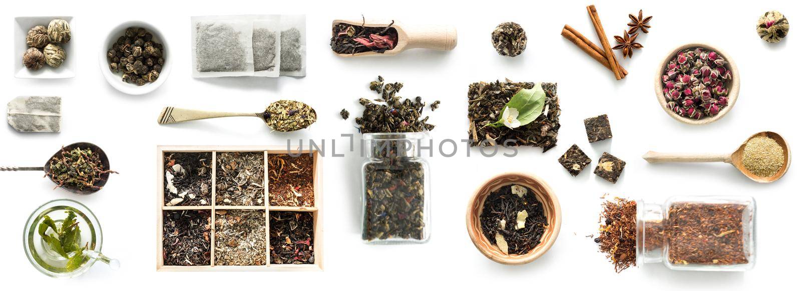 Various kinds of tea, spoons and rustic dishware, brewed green tea, cinnamon, topview. isolated on a white background