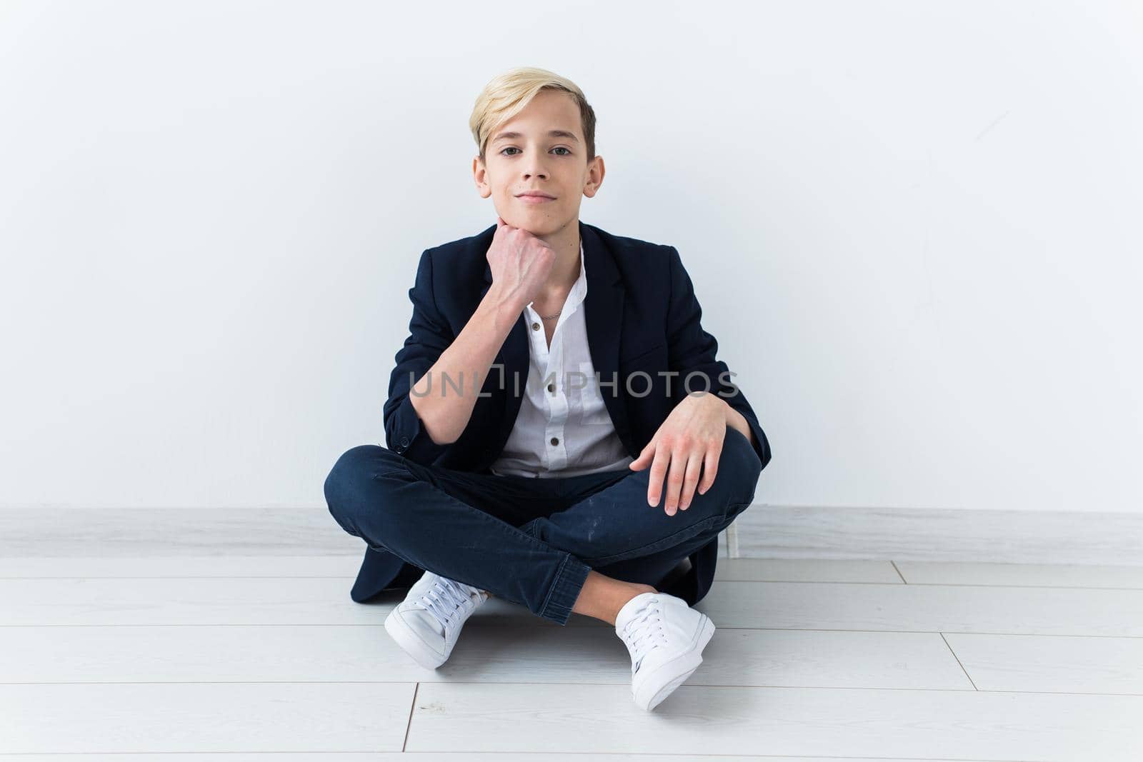 Puberty concept - Teenage boy portrait on a white background. by Satura86