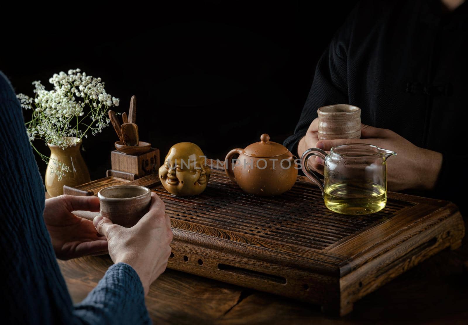 tea ceremony hand men and women to pour the tea by Rotozey