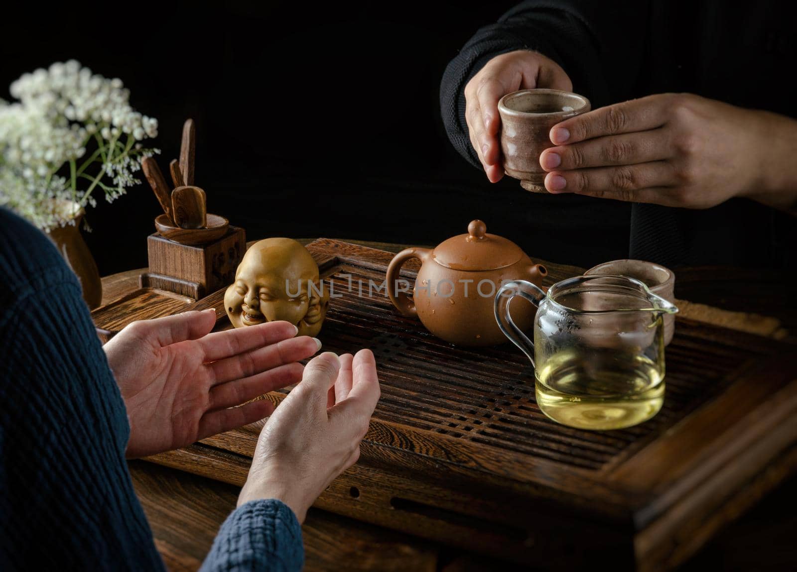 tea ceremony hand men and women to pour the tea by Rotozey