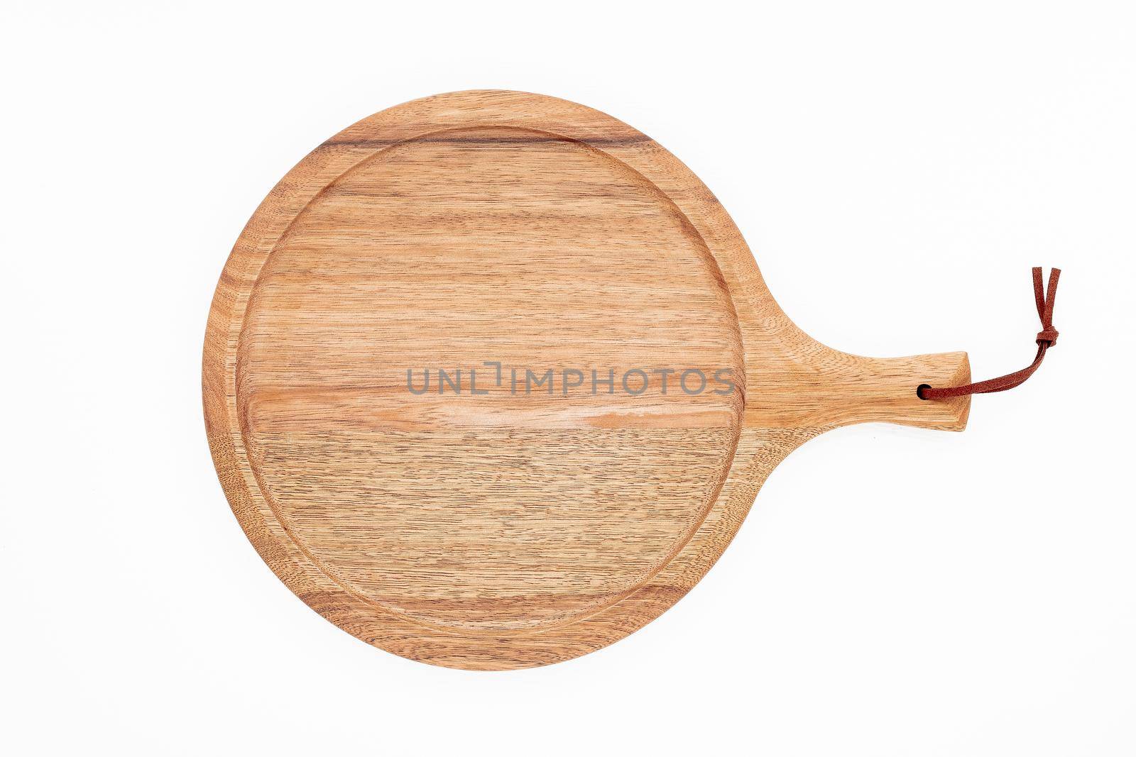 Empty wooden pizza platter set up on white background. Pizza board on white wooden background flat lay and copy space.