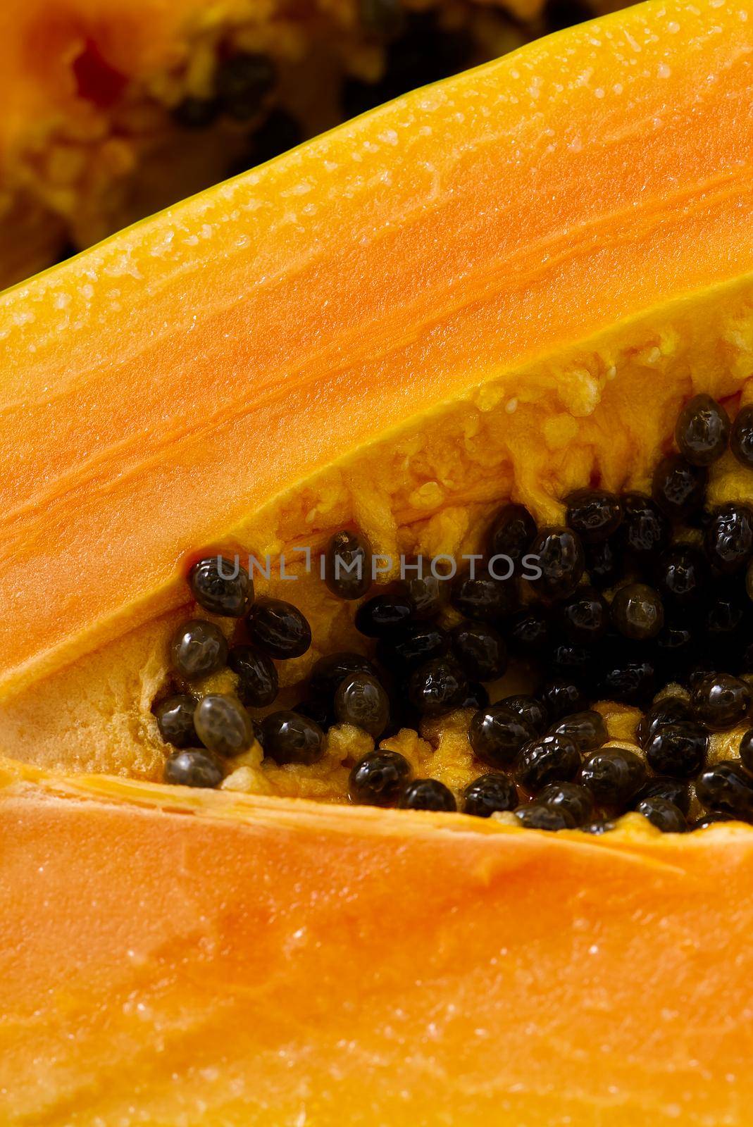 papaya isolate on white. delicious ripe papaya cut in half close-up by PhotoTime