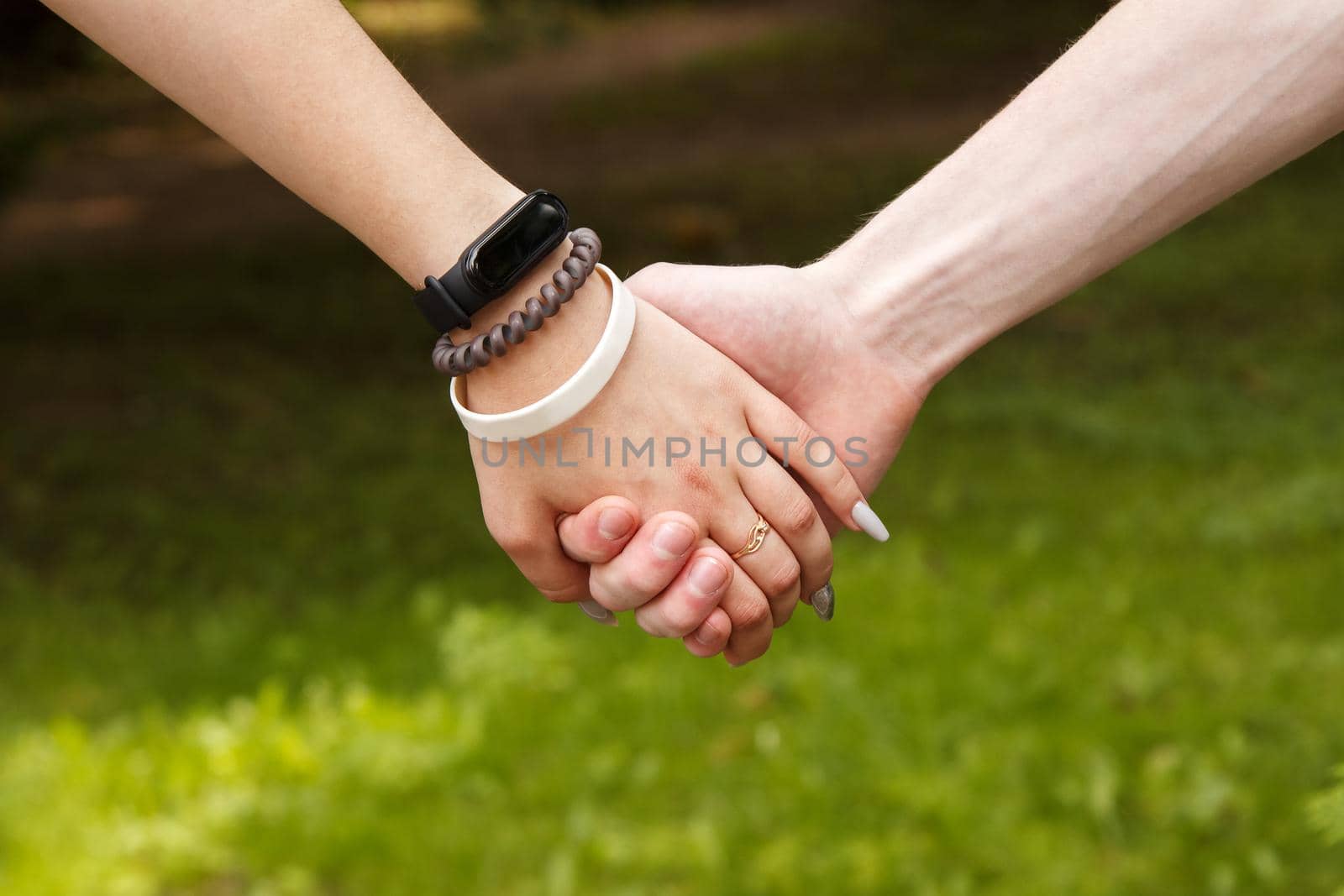 man and woman holding hands by raddnatt