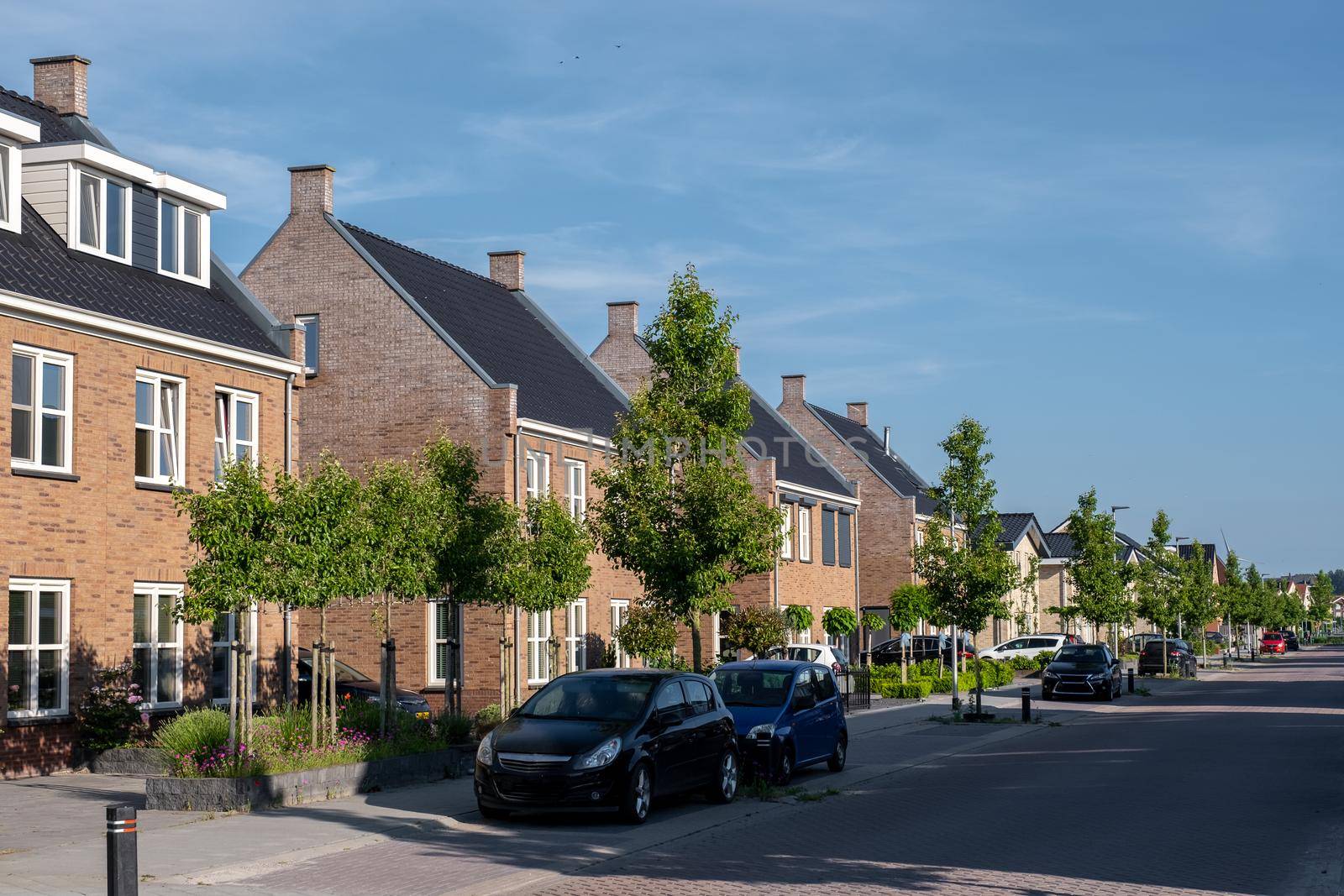 Dutch Suburban area with modern family houses, newly build modern family homes in the Netherlands, dutch family house, apartment house. Netherlands