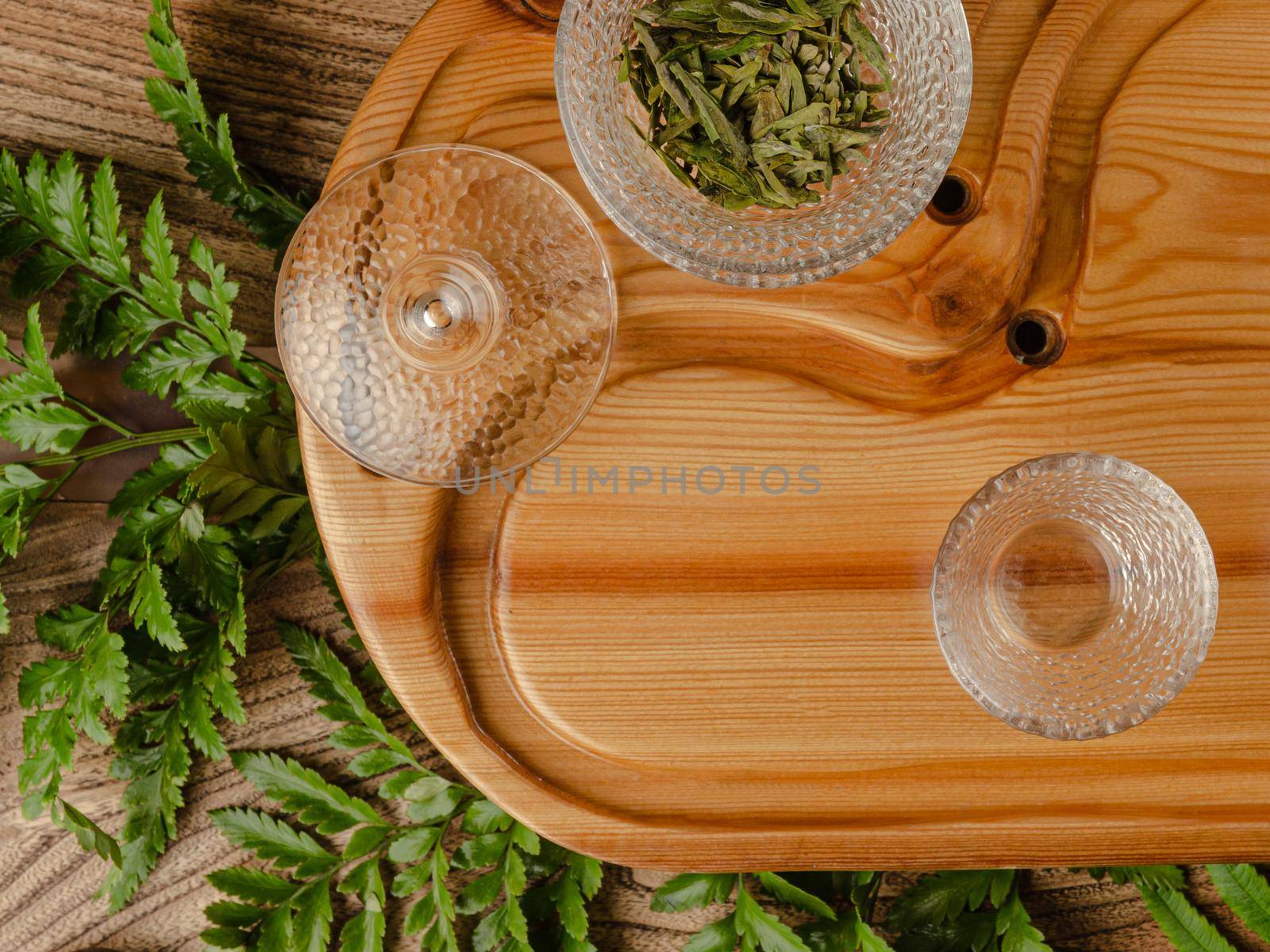 the tea table with instruments teapots cups pancake and tea Shen Puer