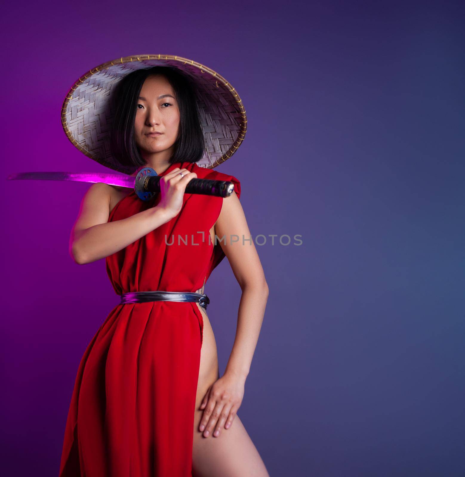 the portrait of an Asian woman in a red cape and an Asian hat with a katana in her hand image of a samurai