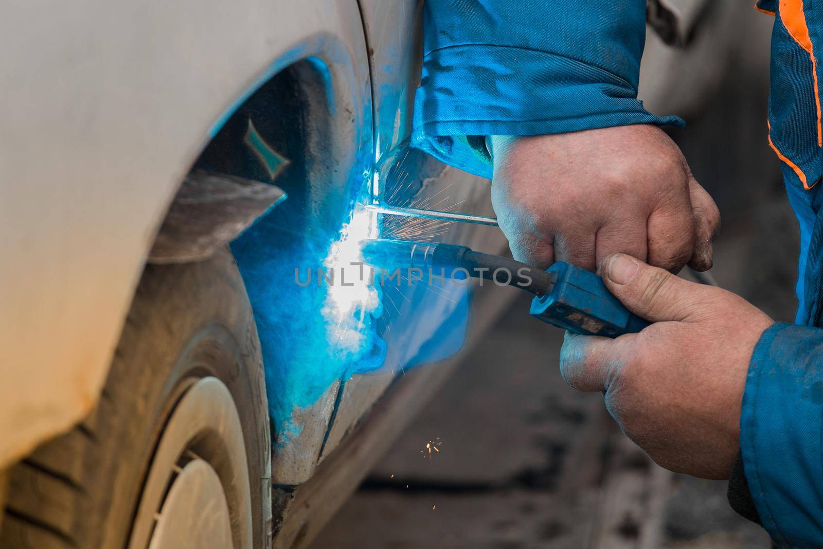 Welding and metal works repair of the car body.