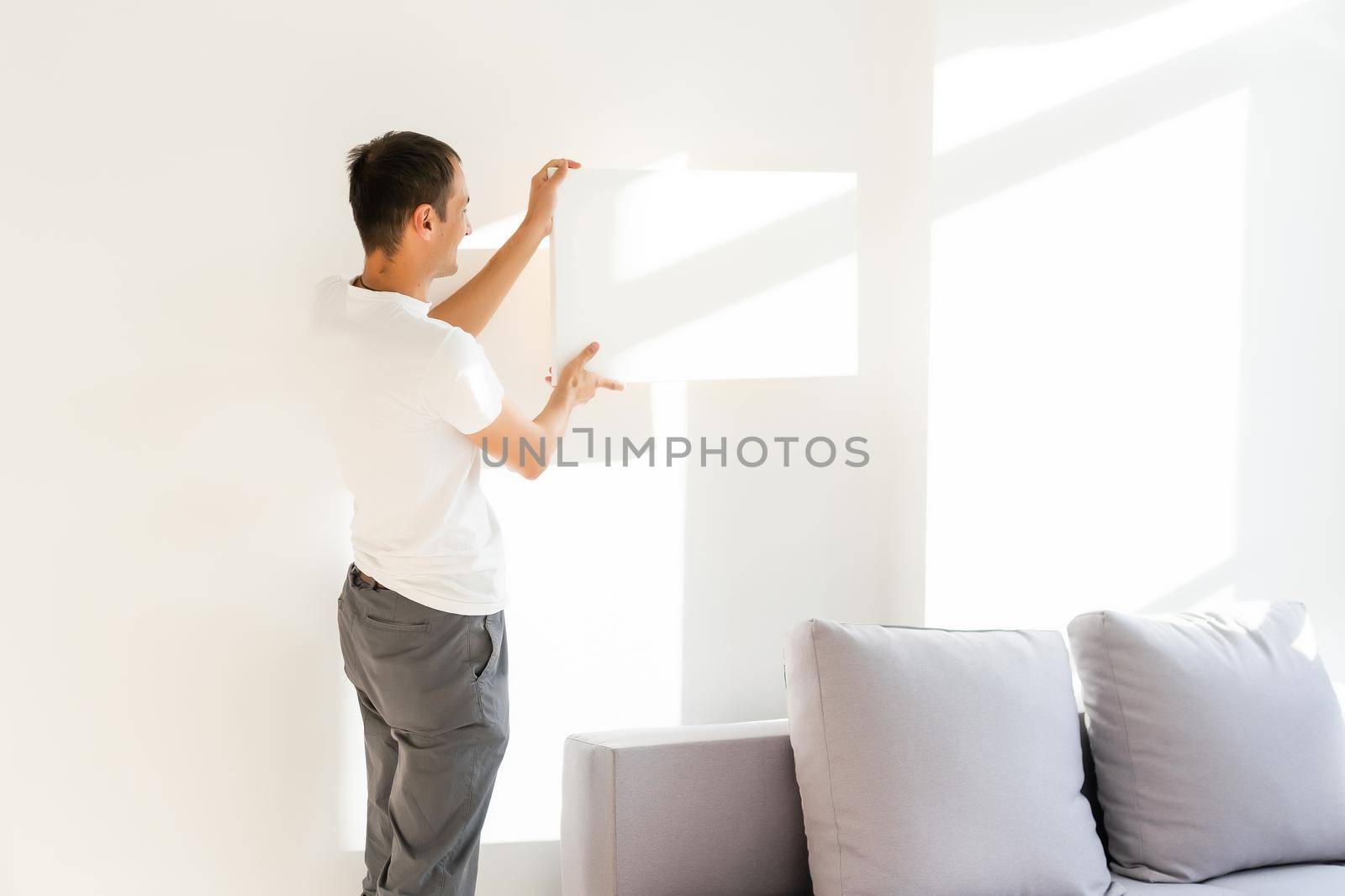 man with canvas mockup. Photo Mockup. The man hold canvas. For canvas design.