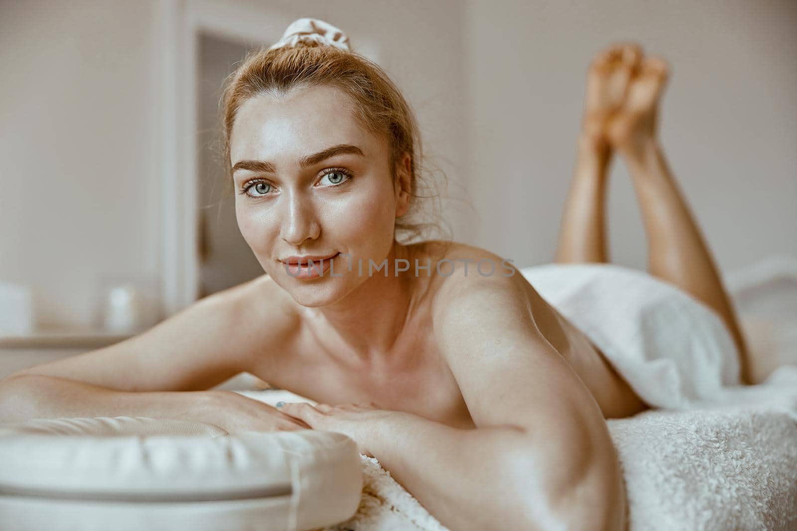 beautiful caucasian woman on the massagist coachin salon by Yaroslav_astakhov