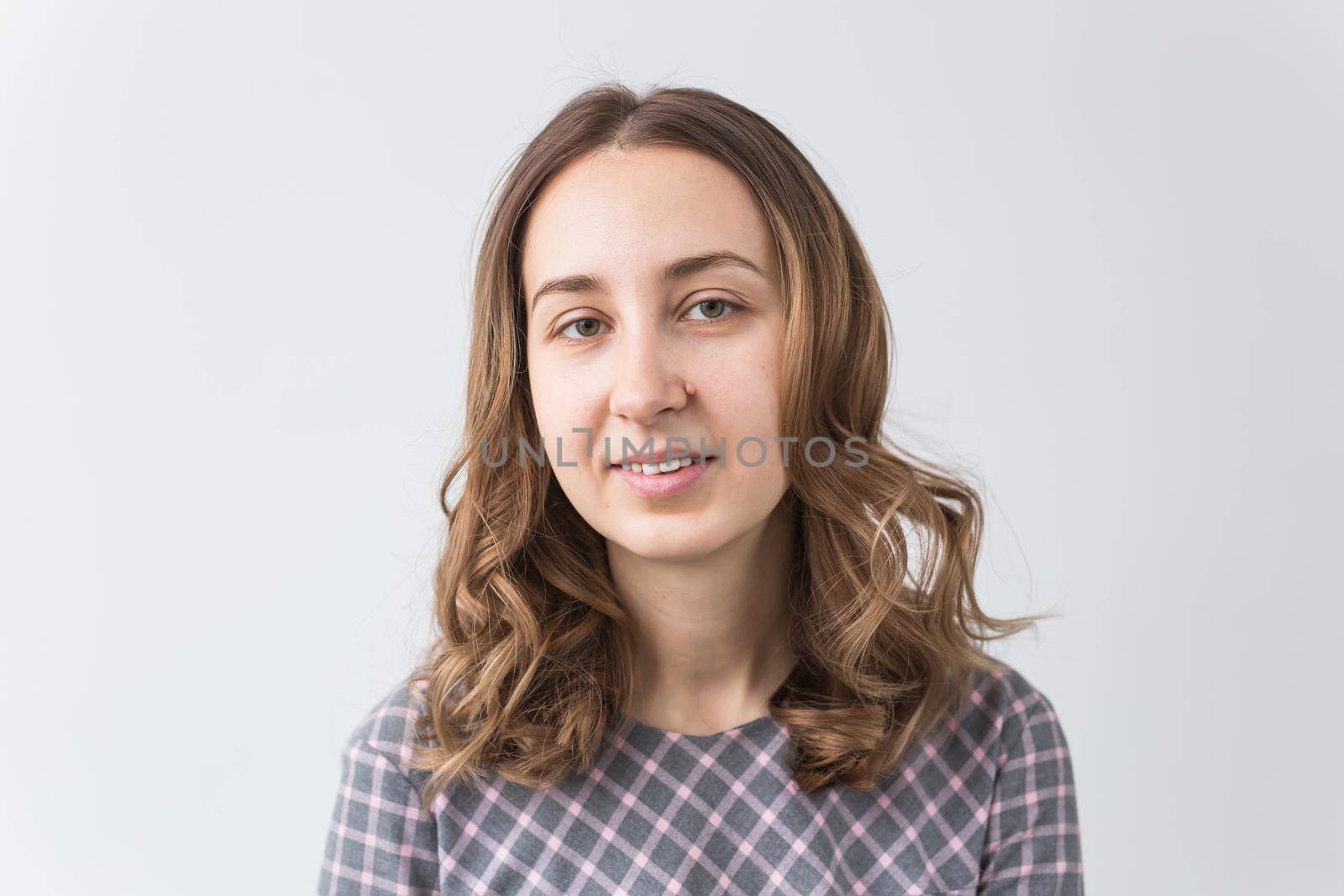 face of a beautiful young girl with a clean fresh face close up