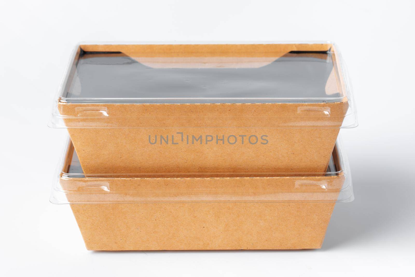 Cardboard brown food box pack isolated on white background close up