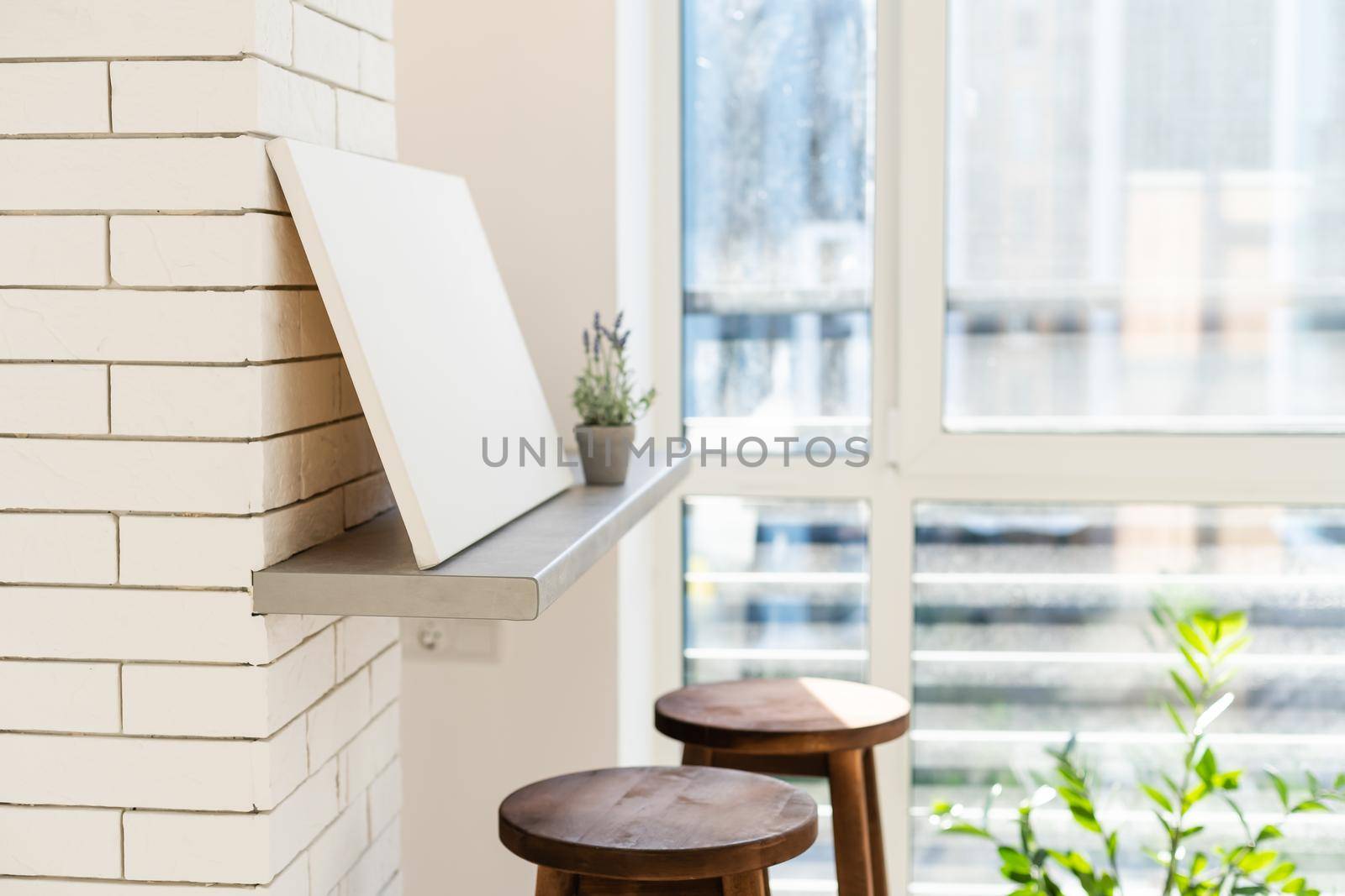 white photo canvas stands in the room