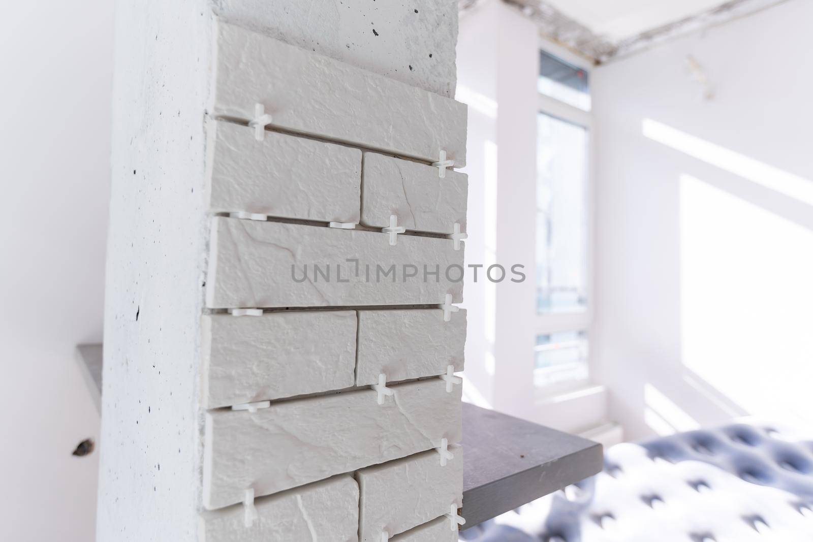 Interior of apartment with materials during on the renovation and construction, remodel wall from gypsum plasterboard or drywall
