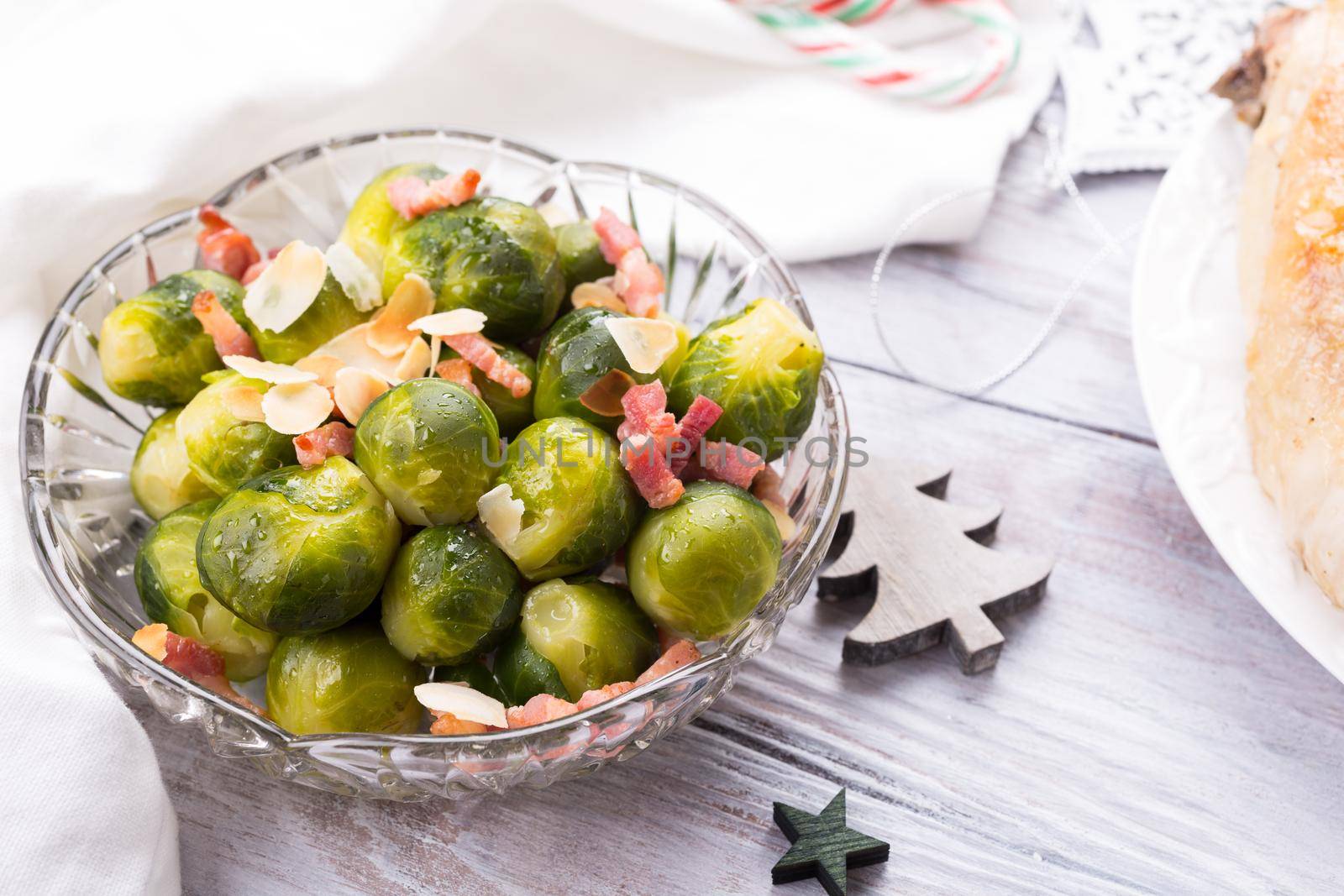 Brussels sprouts with fried bacon and almonds. by IrynaMelnyk