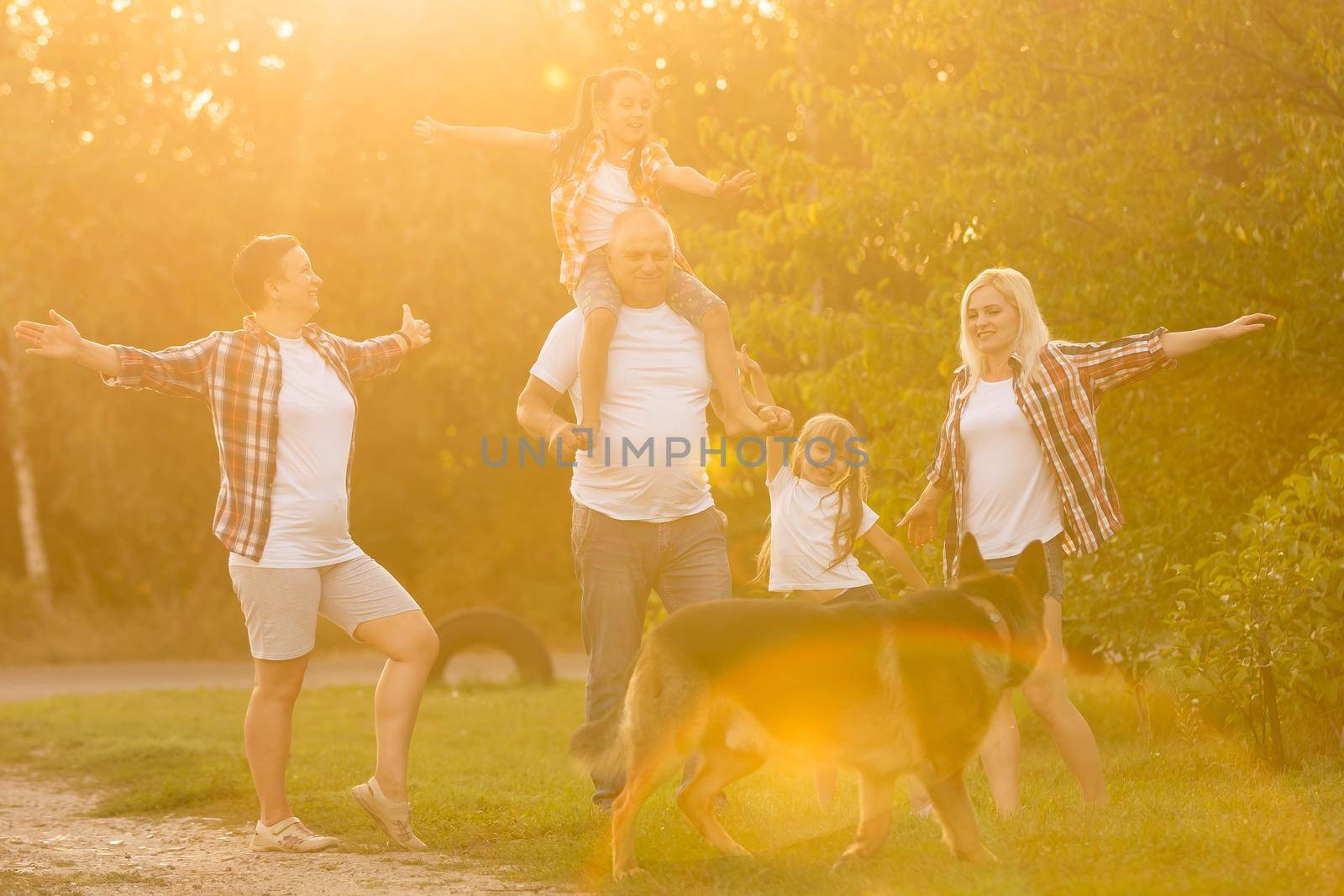 Family Walking Dog Togetherness Nature Concept by Andelov13