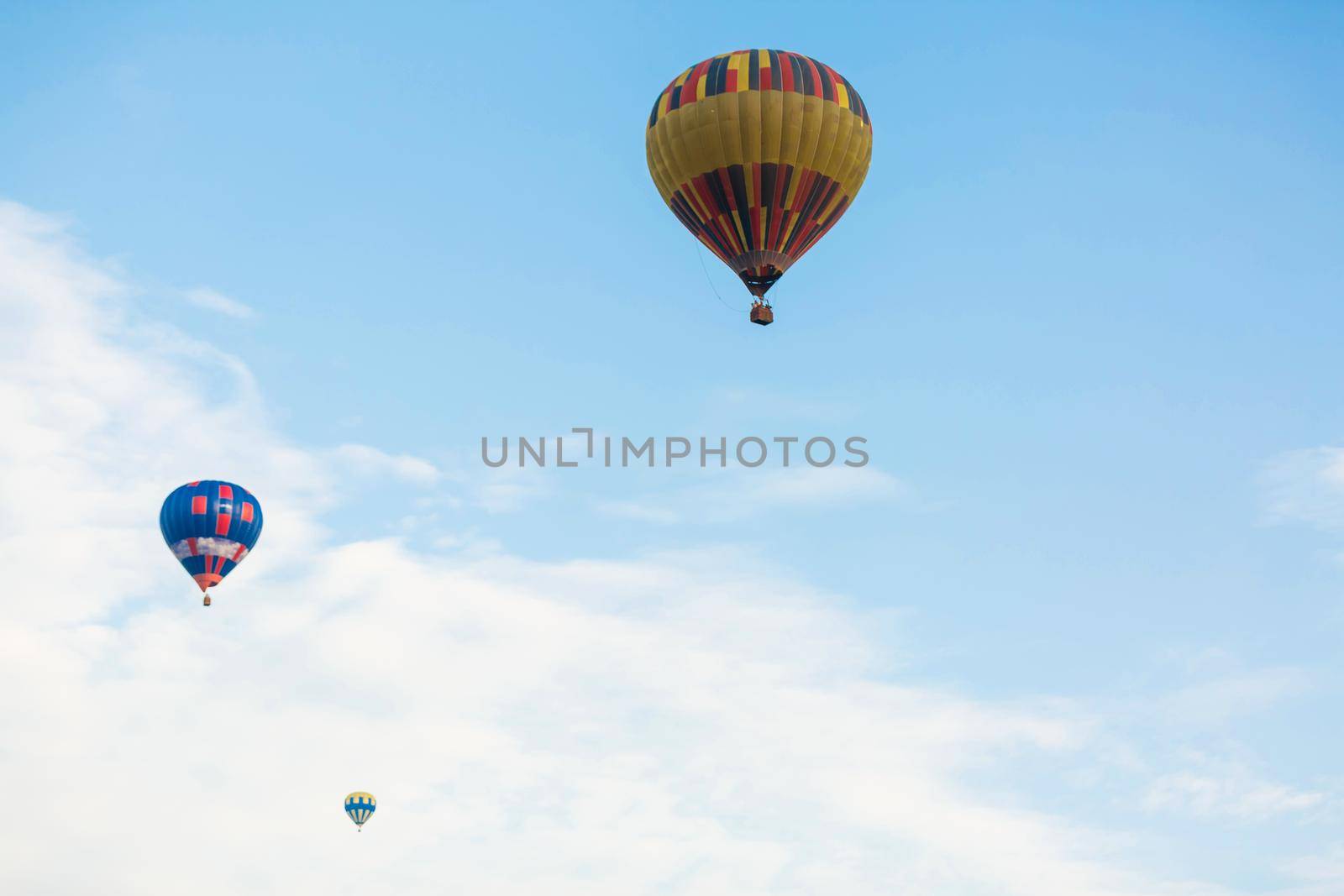 hot air balloon over blue sky. Composition of nature and blue sky background