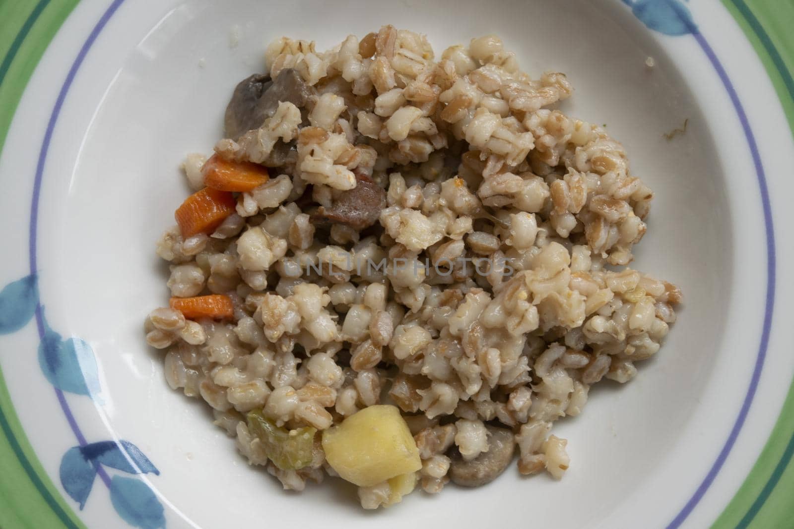 spelled soup with mix and vegetables and potatoes