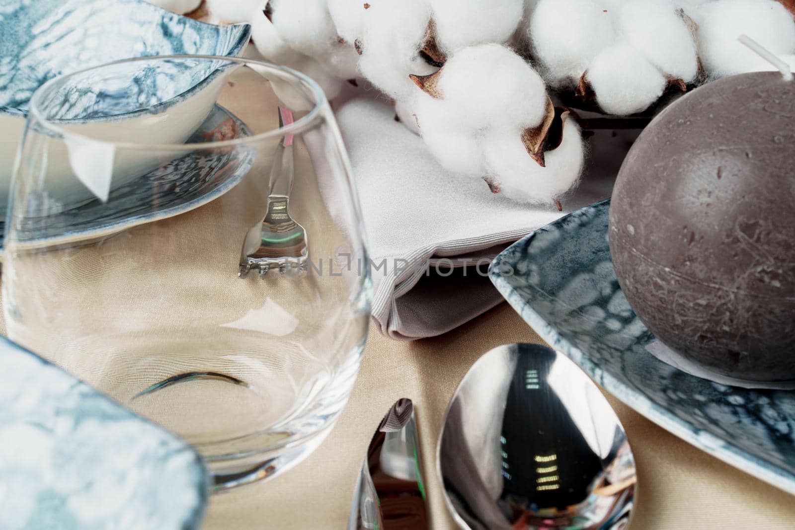 Beautiful table setting decorated with cotton buds. High quality photo