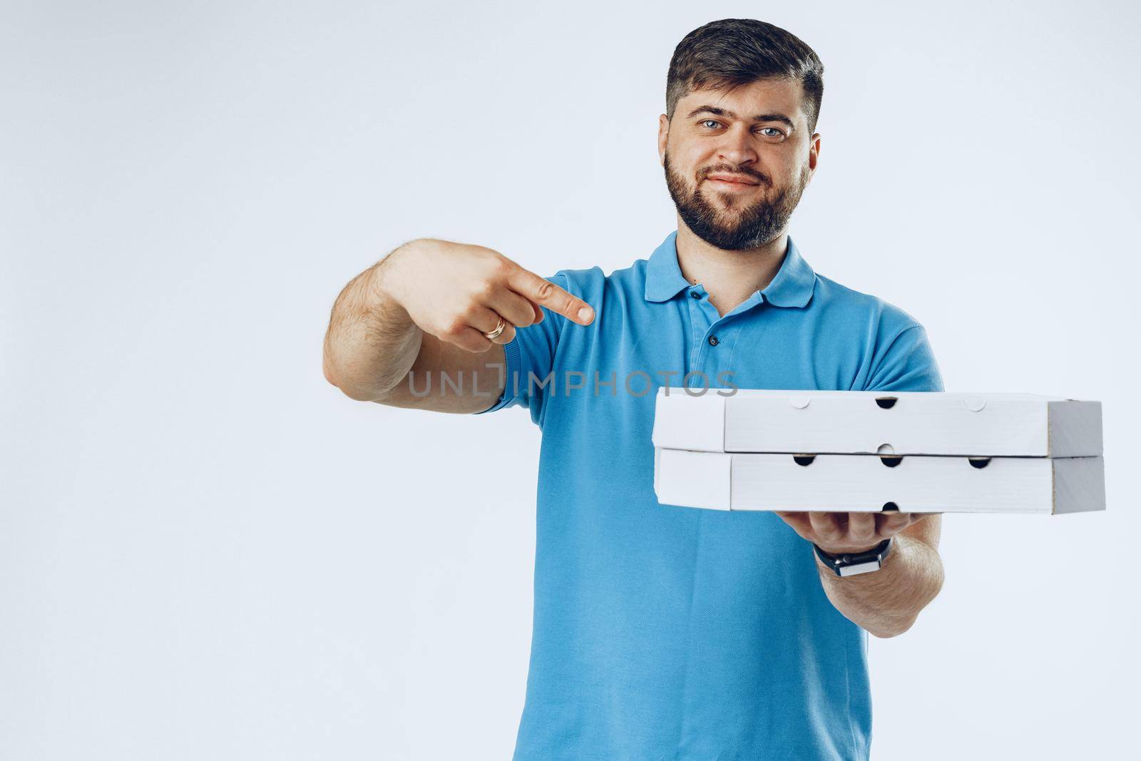 Food delivery courier with order on light grey background