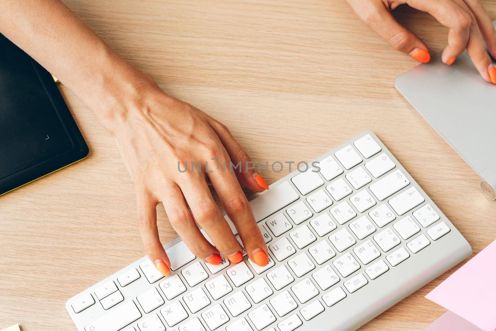 Stay safe and working from home. Young woman working at home. Close up.